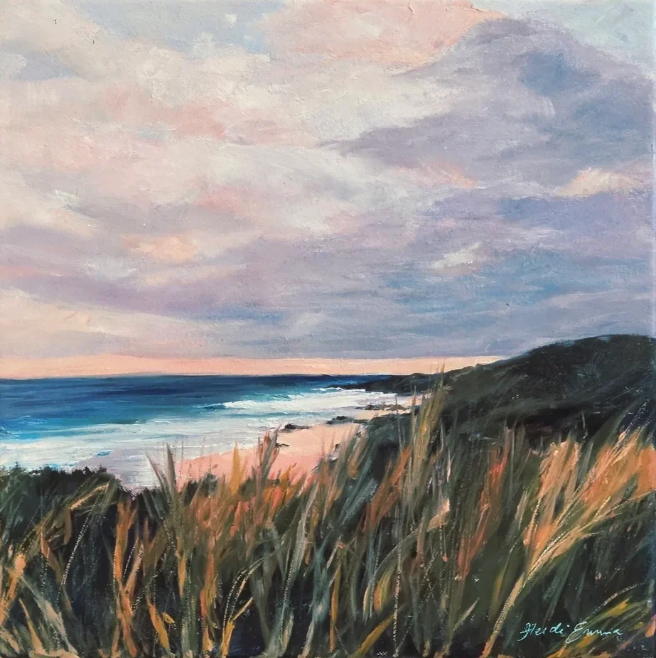 Days End features a sunset vista of coastline near Cape Naturaliste with golden grasses in the foreground and pink purple and peach clouds and distant waves