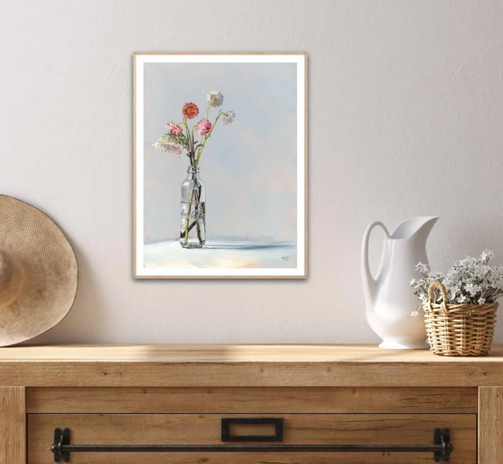 example of Joy paper print framed in oak above an Oak Buffet country styling.webp