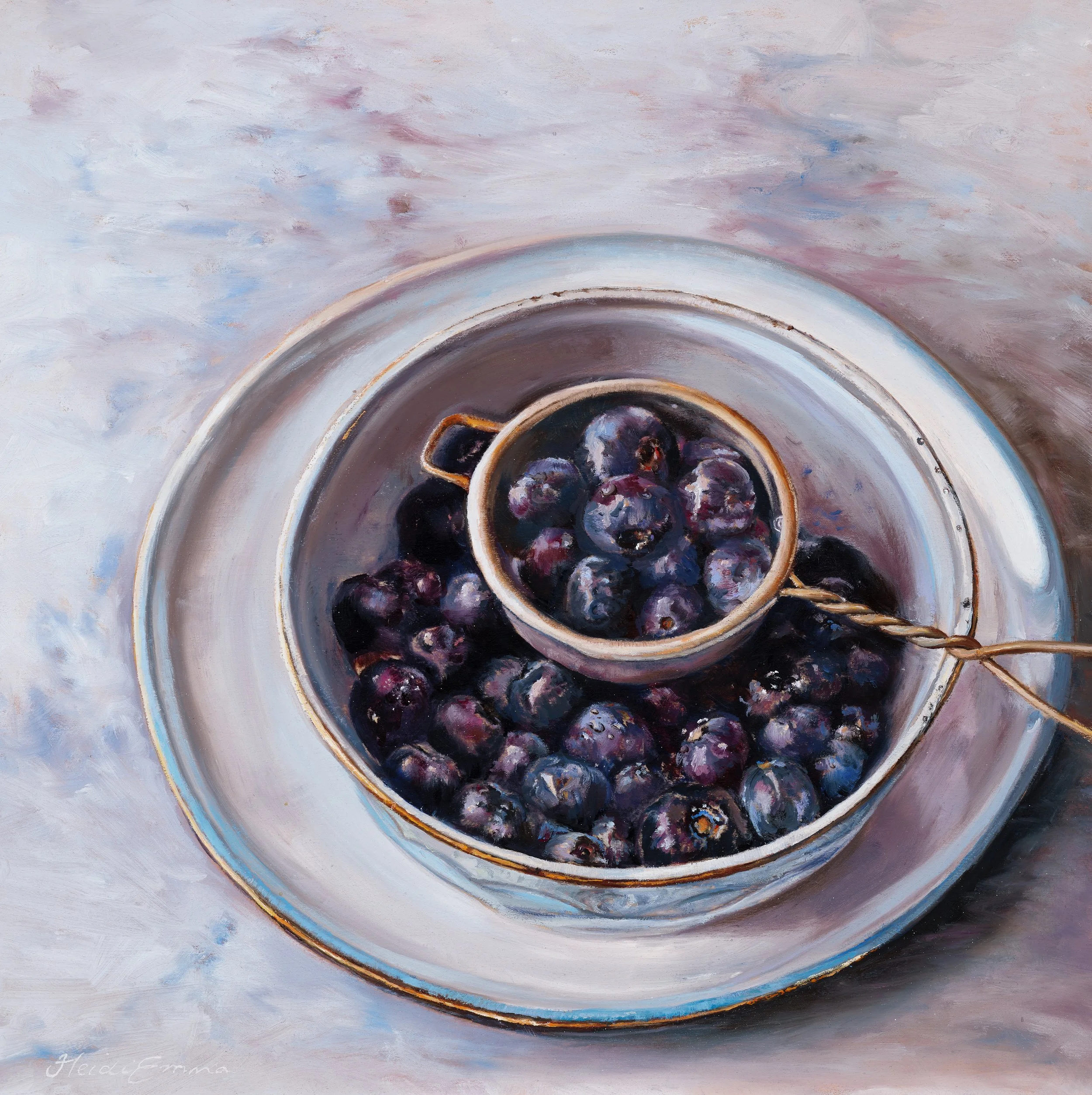Berries VI original oil painting by Heidi Emma featuring blueberries in a small metal strainer resting inside a reflective silver bowl.