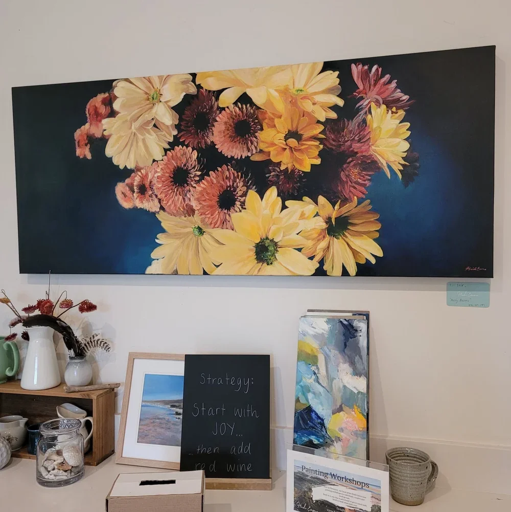moody blooms hanging in studio.webp