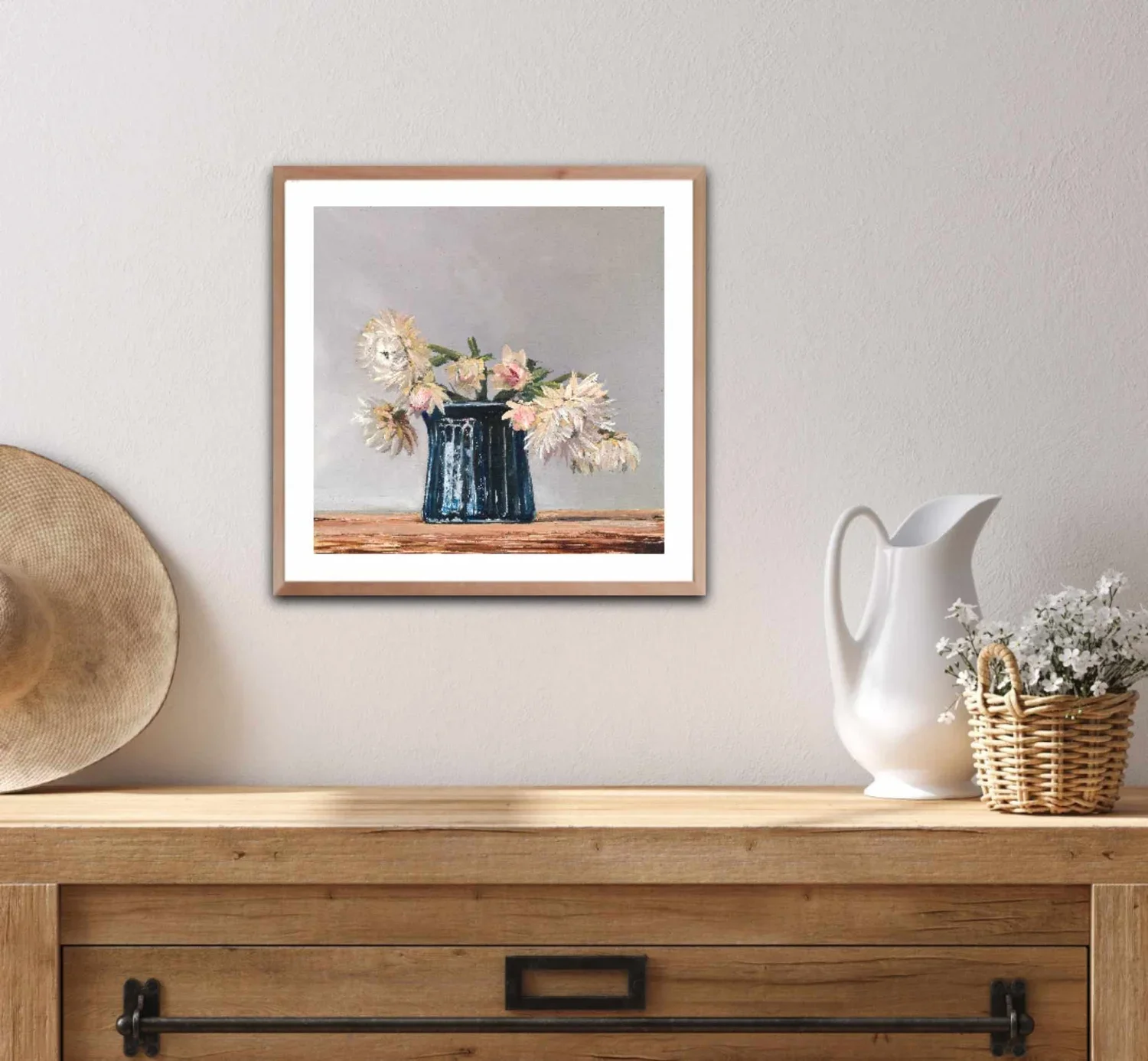 Contentment framed in oak above a country style buffet.webp