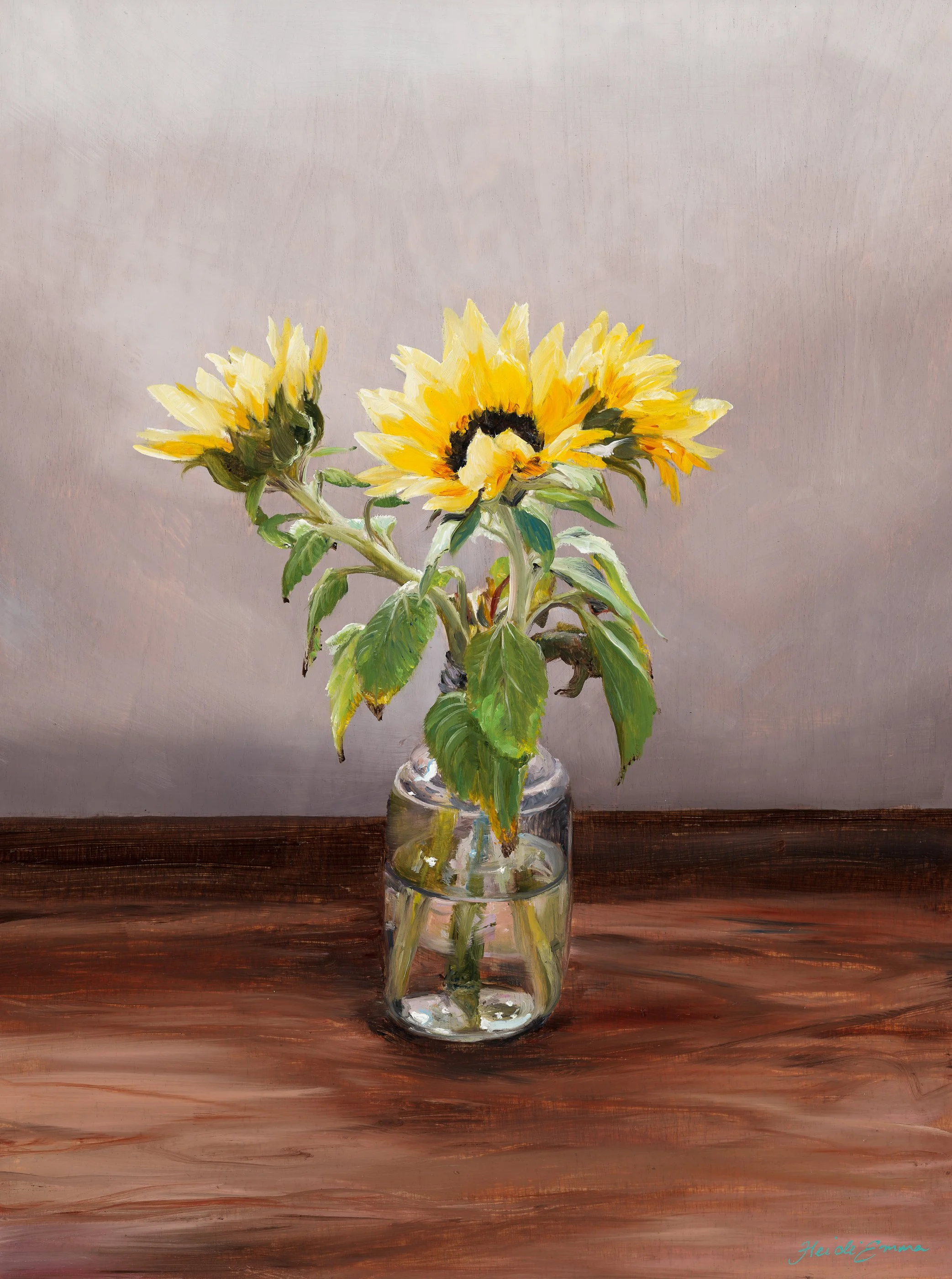 Rachel’s Posy sunflower fine art print by Heidi Emma featuring yellow sunflowers arranged in a clear glass jar on a warm wooden kitchen bench.