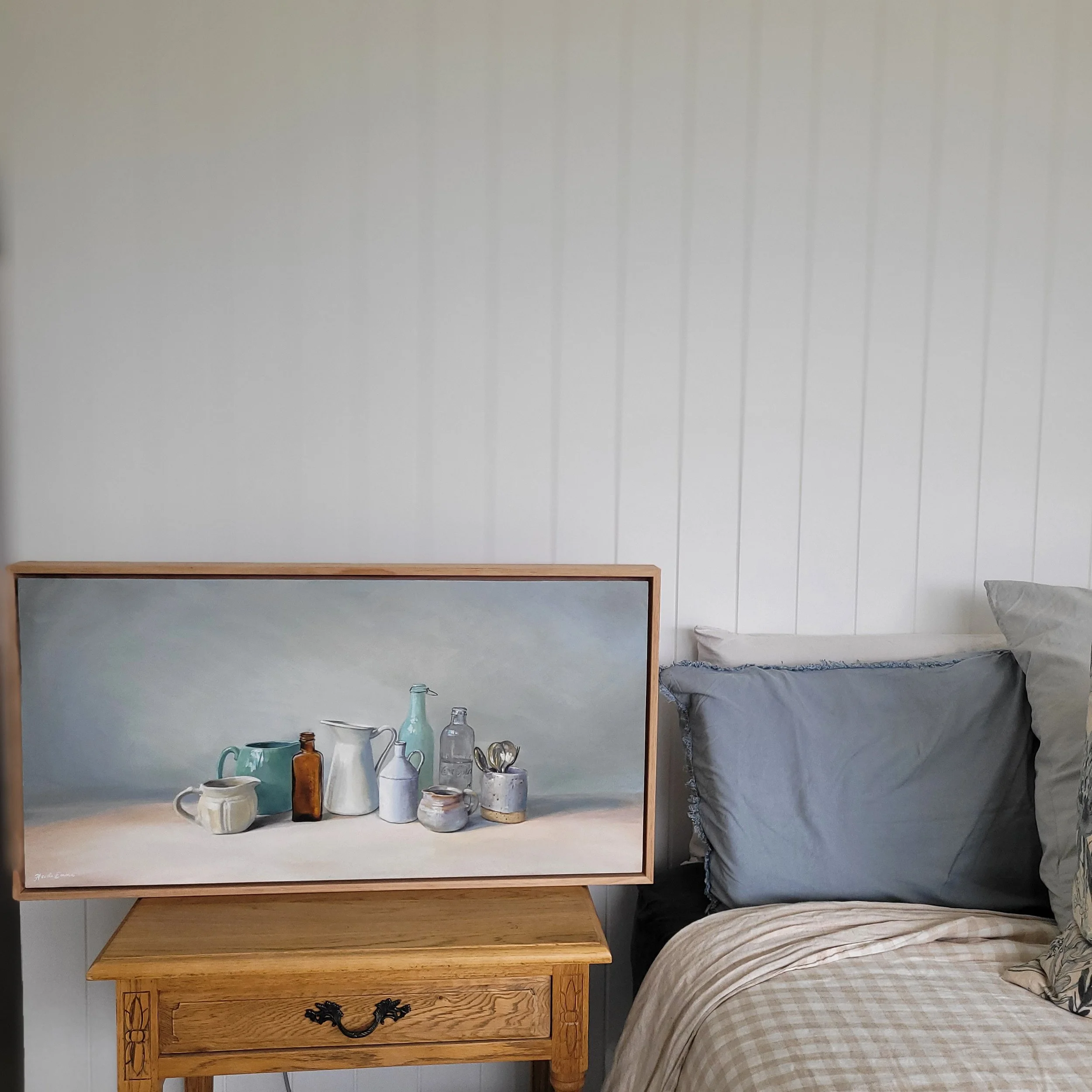 Together is Better sitting on a farmhouse style bedside table with vj panelled wall behind