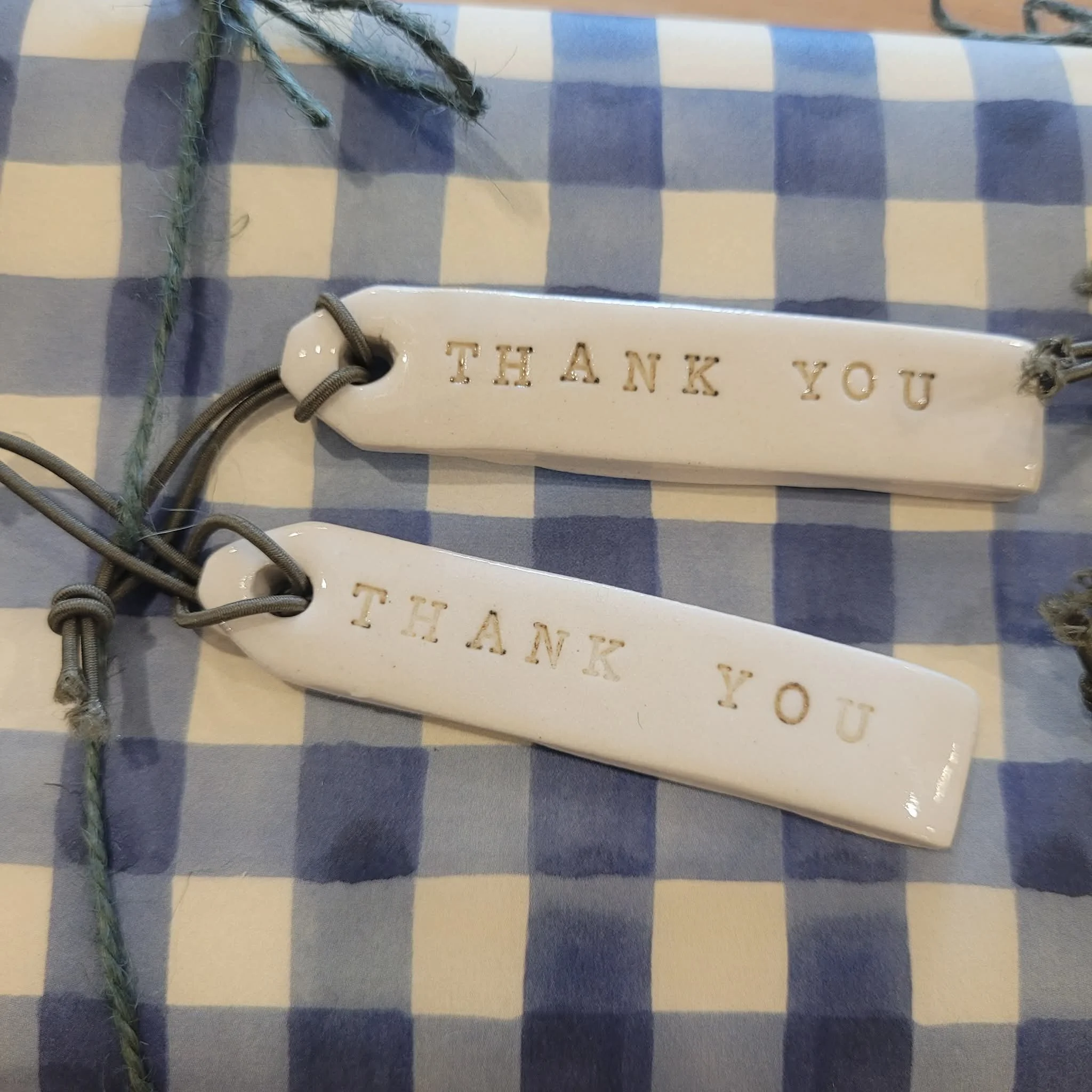 Ceramic gift tags that say Thank You by My Earthy Life elevate your gift giving