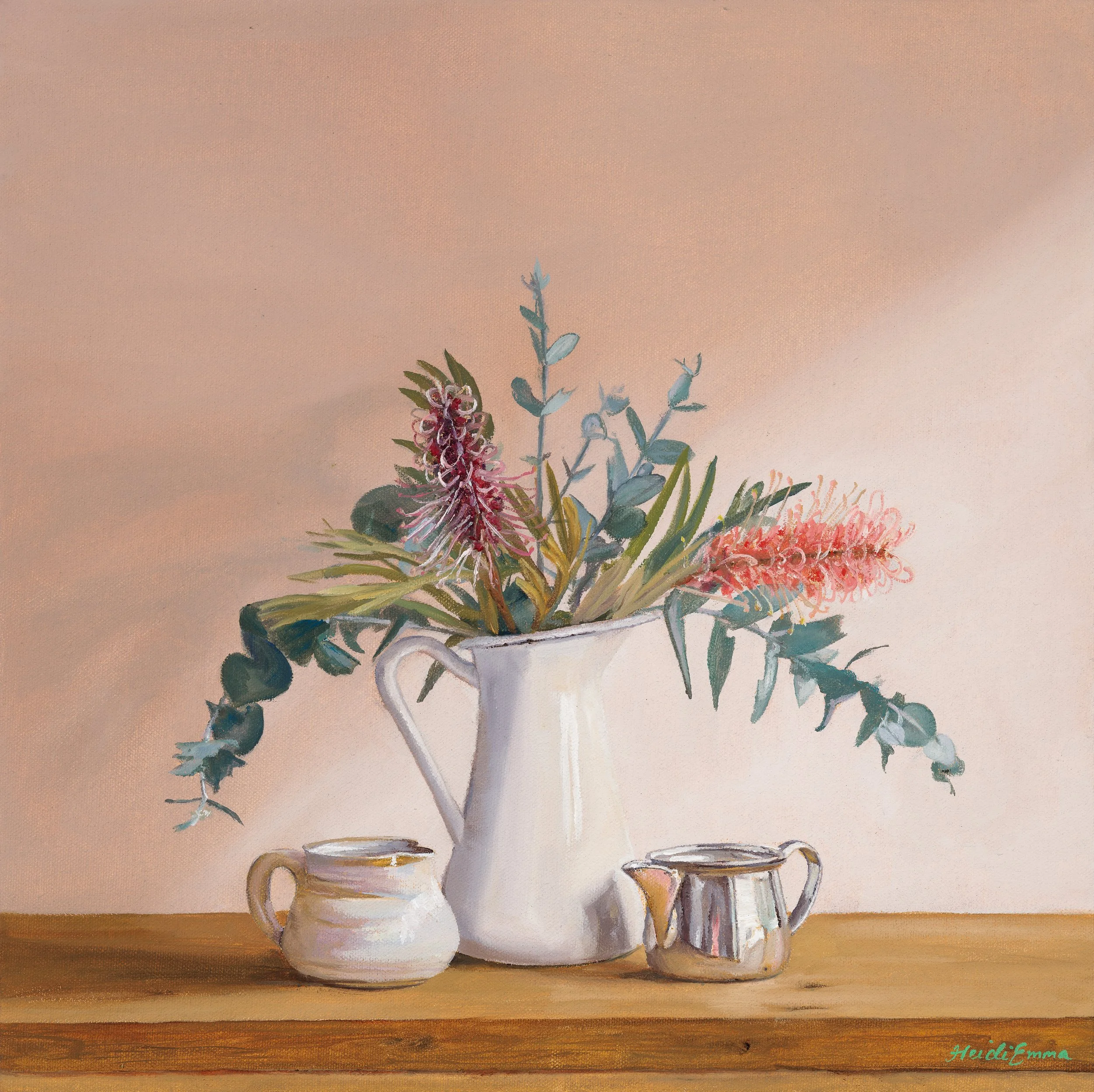 Nestled fine art print by Heidi Emma featuring Australian grevilleas and eucalyptus in a white jug with pottery and a reflective silver vessel.