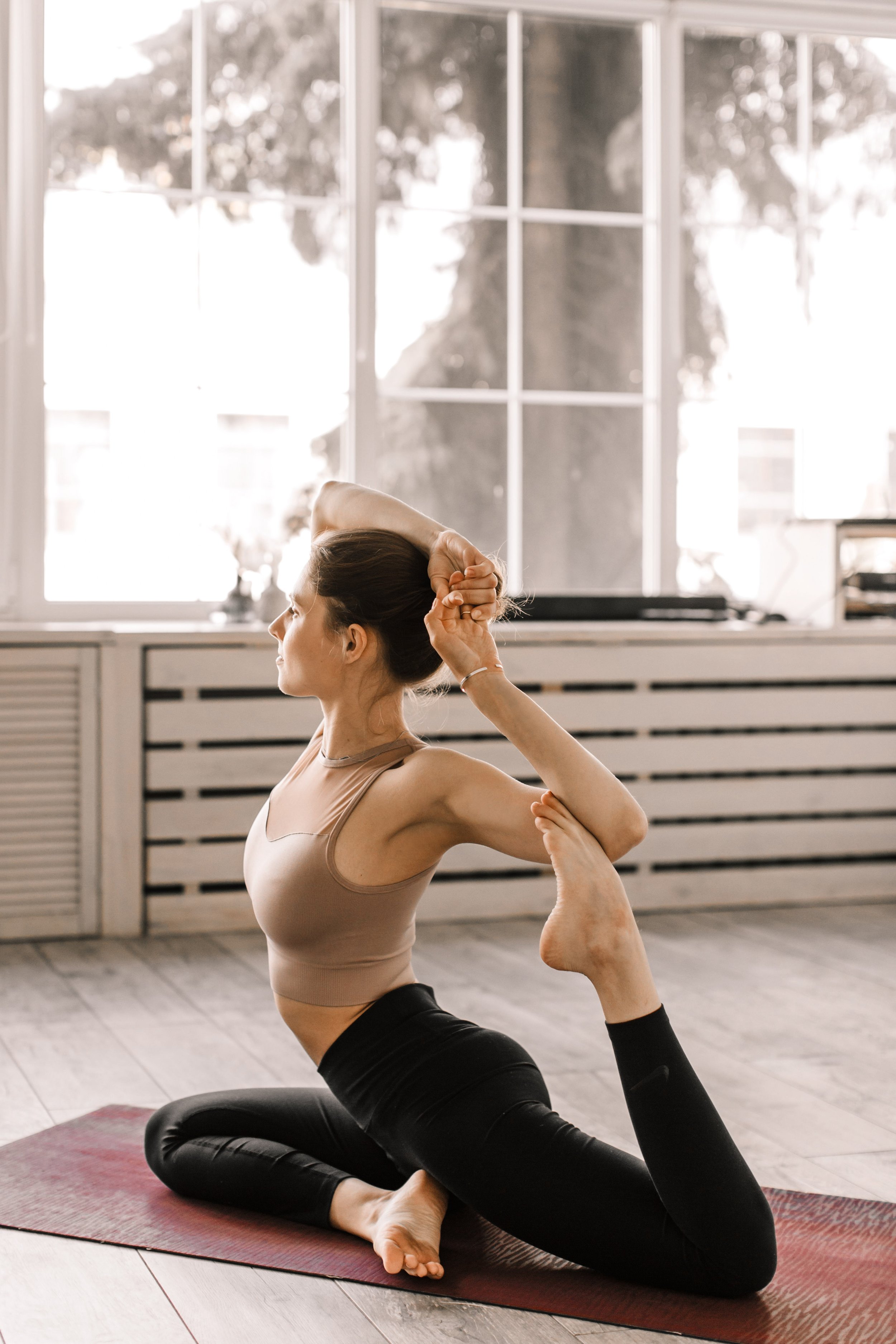 woman practicing yoga