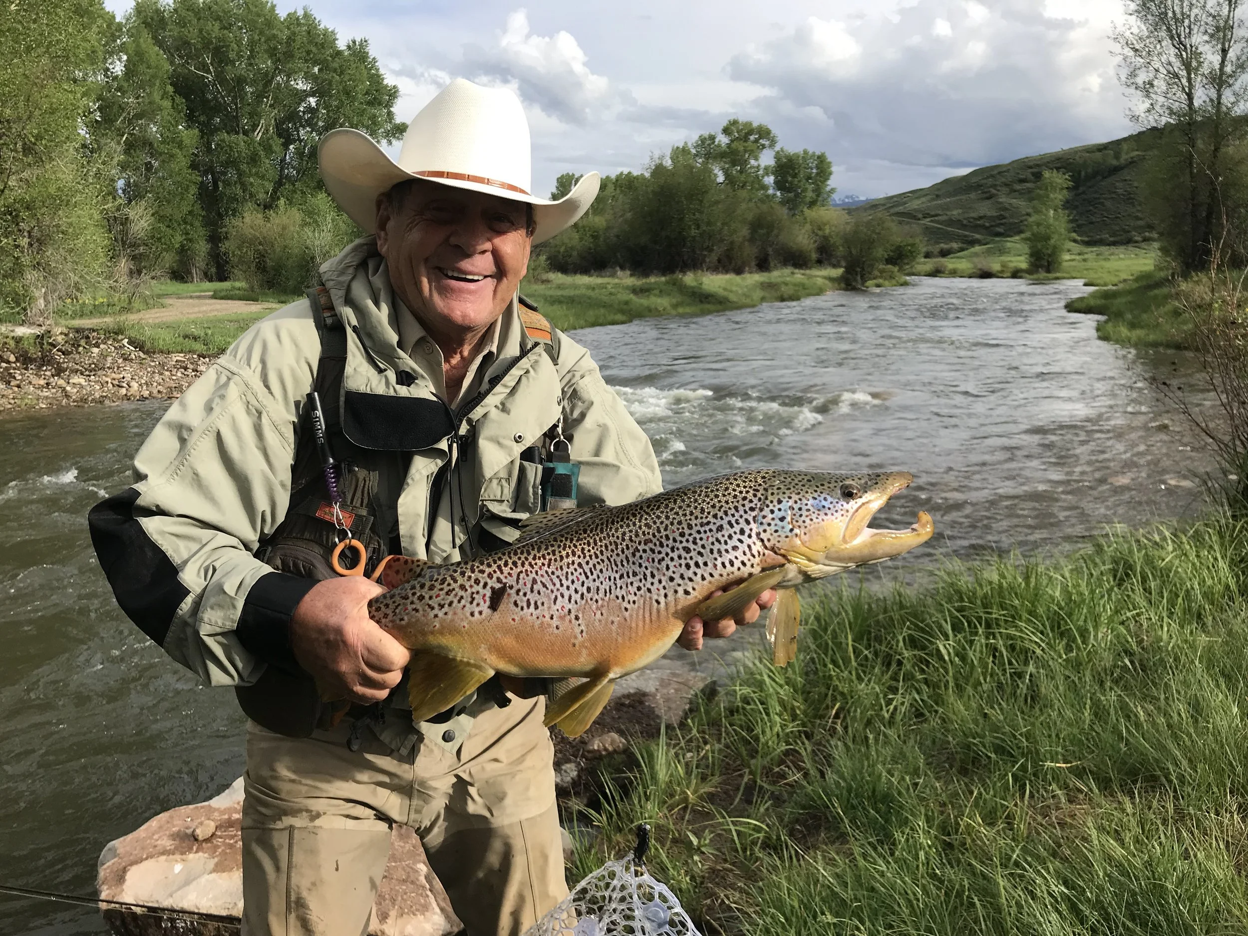 Once the project is completed, we "survey" our stream projects with a fly rod.