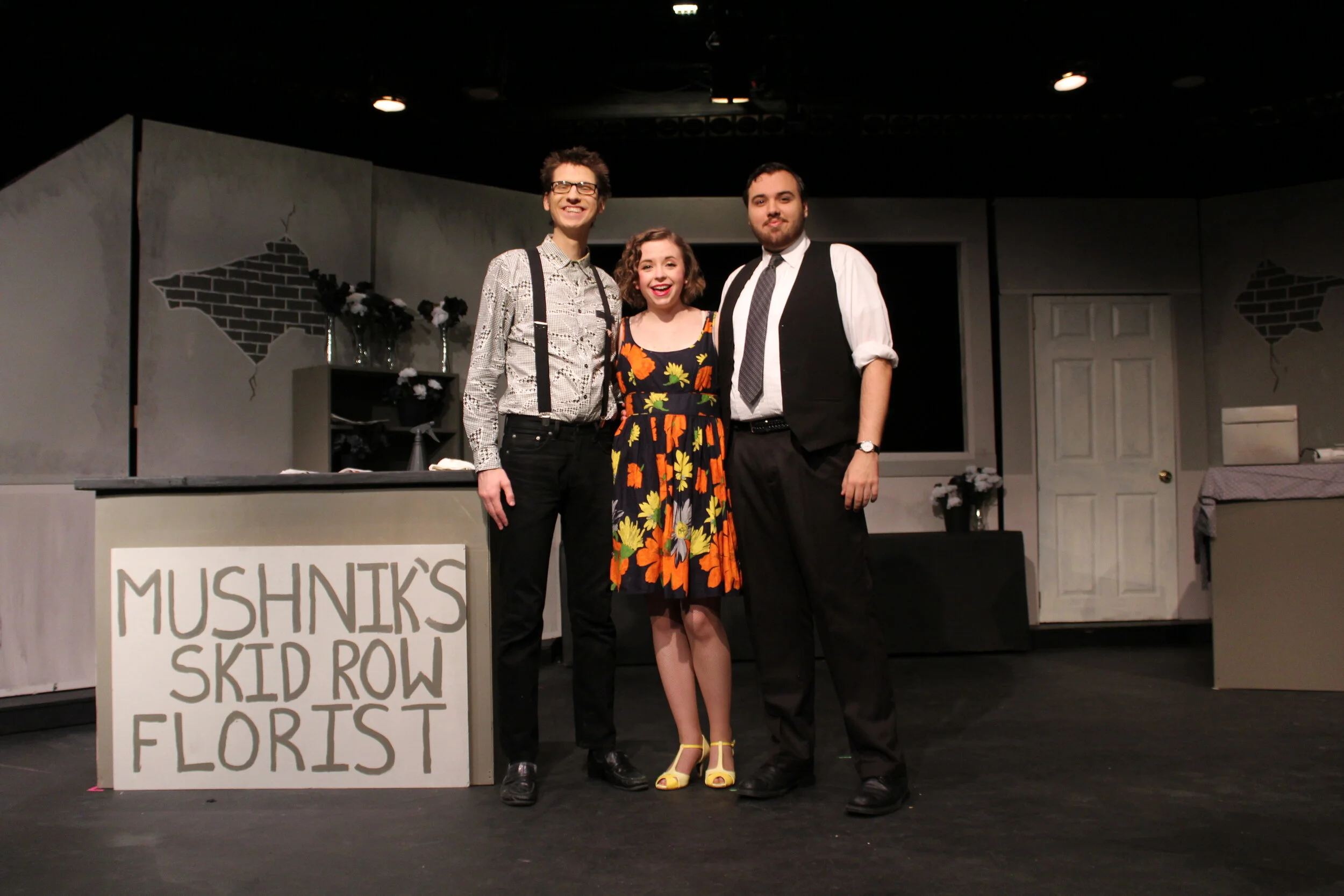  An example of act 1 (black and white ) costumes and the act one set 