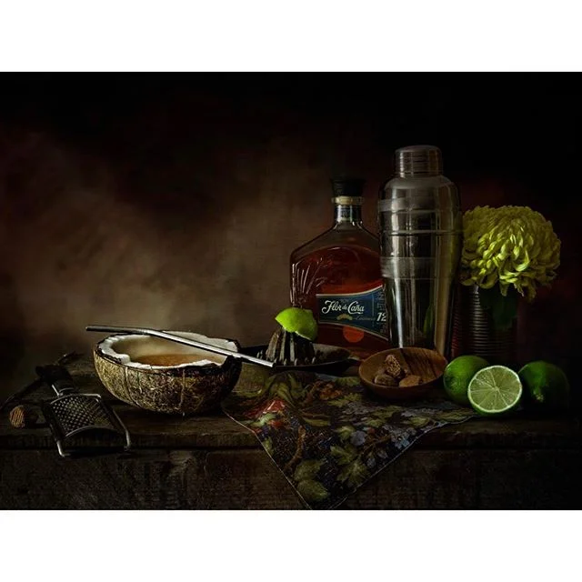 Flor de Caña Coconut Daiquiri 
60ml Flor de Caña 12 year old rum
30ml coconut rum liqueur
15ml Coconut water (from the coconut used as a 'glass')
15ml fresh lime juice
10 ml fresh pineapple juice (from previous cocktail)  I may be lucky in finding a 