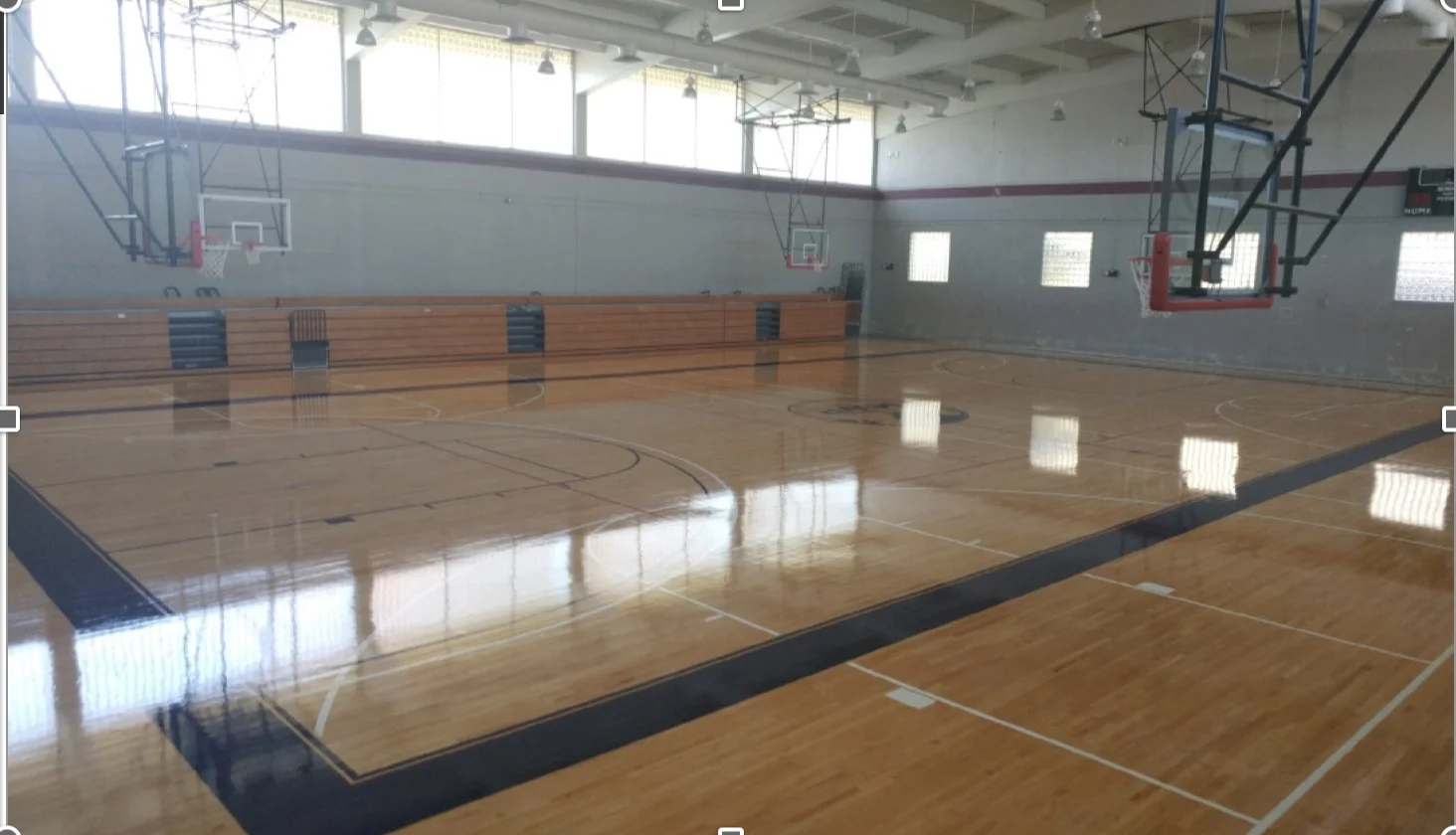 Title/Location: Athletic Courts Installation/Repair Customer Name: Department of United States Army; Hosking Physical Fitness Center, Hercules Physical Fitness Center Bldg; Fort Bragg, North Carolina (Photo 1 of 2) Installed and repaired Basketball courts. This project required installation or repair of existing hardwood flooring, including resurfacing, finishing, sanding, application of oil based urethane coating, and re-striping and marking of athletic court lines. Carolina Group's team provided all labor, equipment and materials necessary to complete to project, as well as debris removal and cleanup. Carolina group performed all ancillary work including installation of doors, door jams, suspended acoustical ceiling system, LED lighting, and H VAC assessment and renovation where necessary.