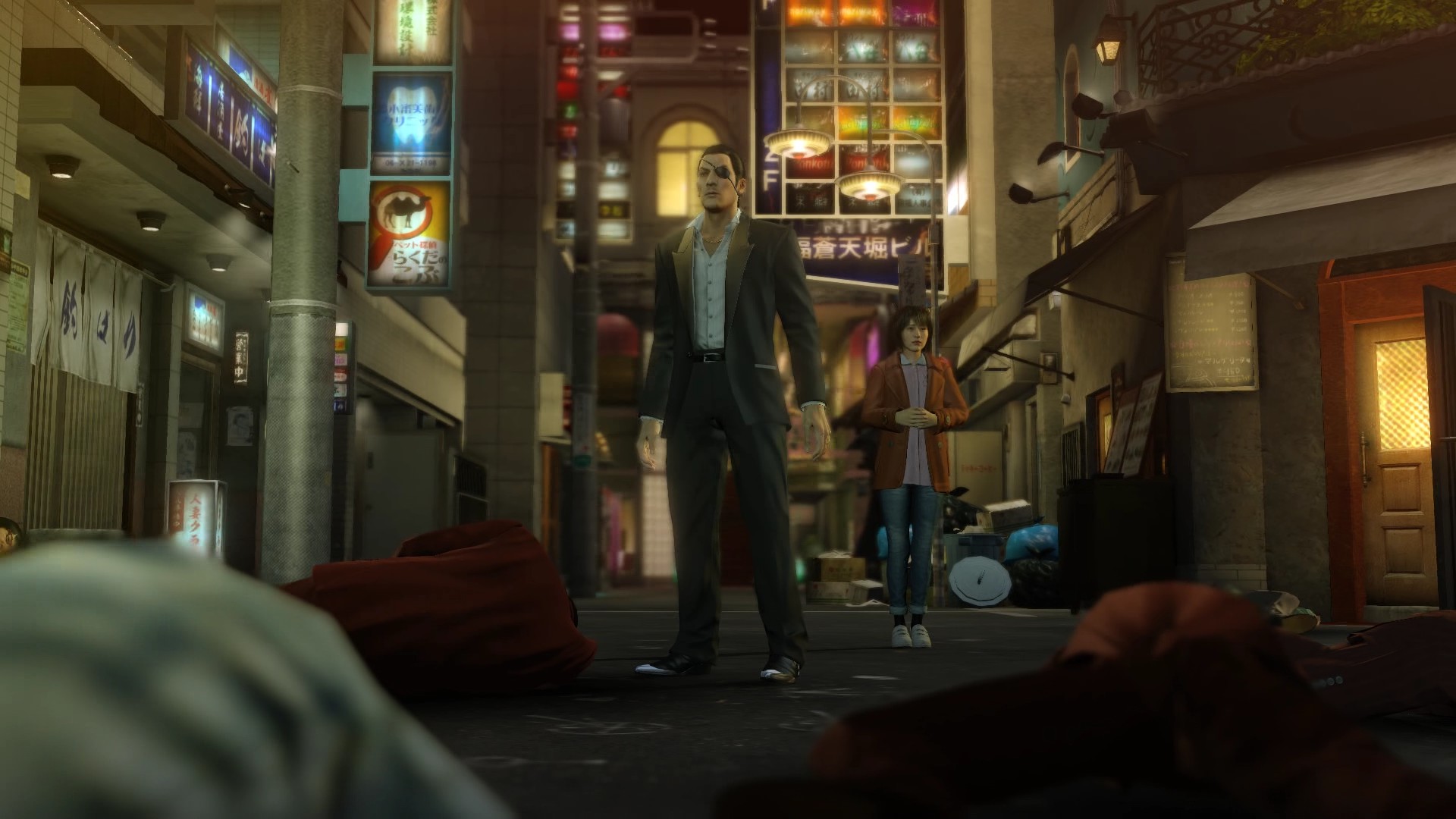 Majima and Kiryu leave a trail of (unconscious) bodies.