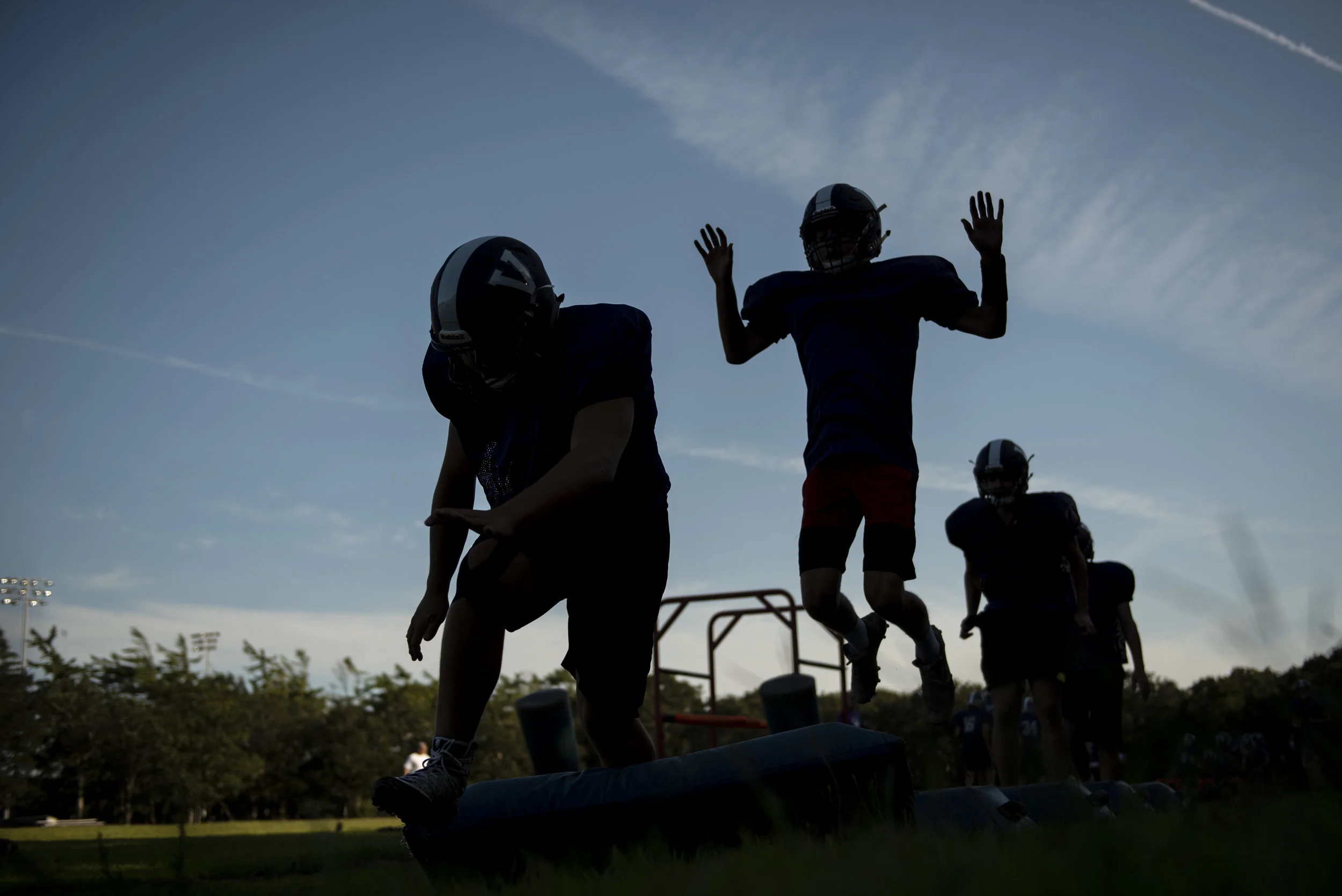  Martha's Vineyard Regional High School football players run drills at practice on Friday night on Friday, August 30, 2019 in Oak Bluffs. 