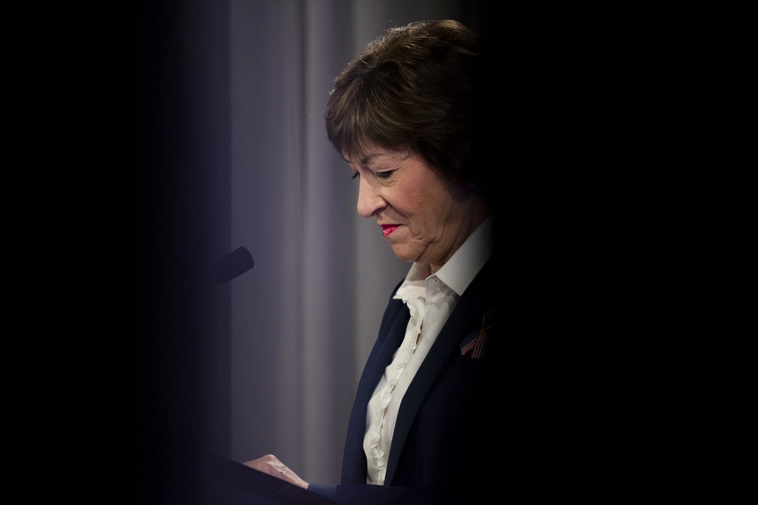  Republican incumbent Sen. Susan Collins takes notes as other candidates take turns answering questions during the first senatorial debate in Portland, Maine on Friday, September 11, 2020.  