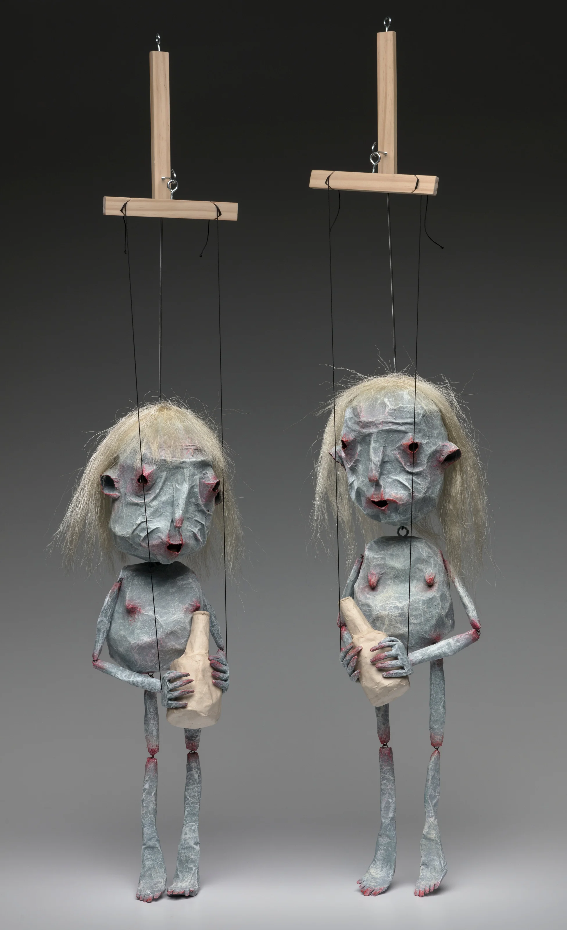   Witnesses,  papier-mâché, wood, wire, acrylic, 36 x 5 x 5”, 2018   