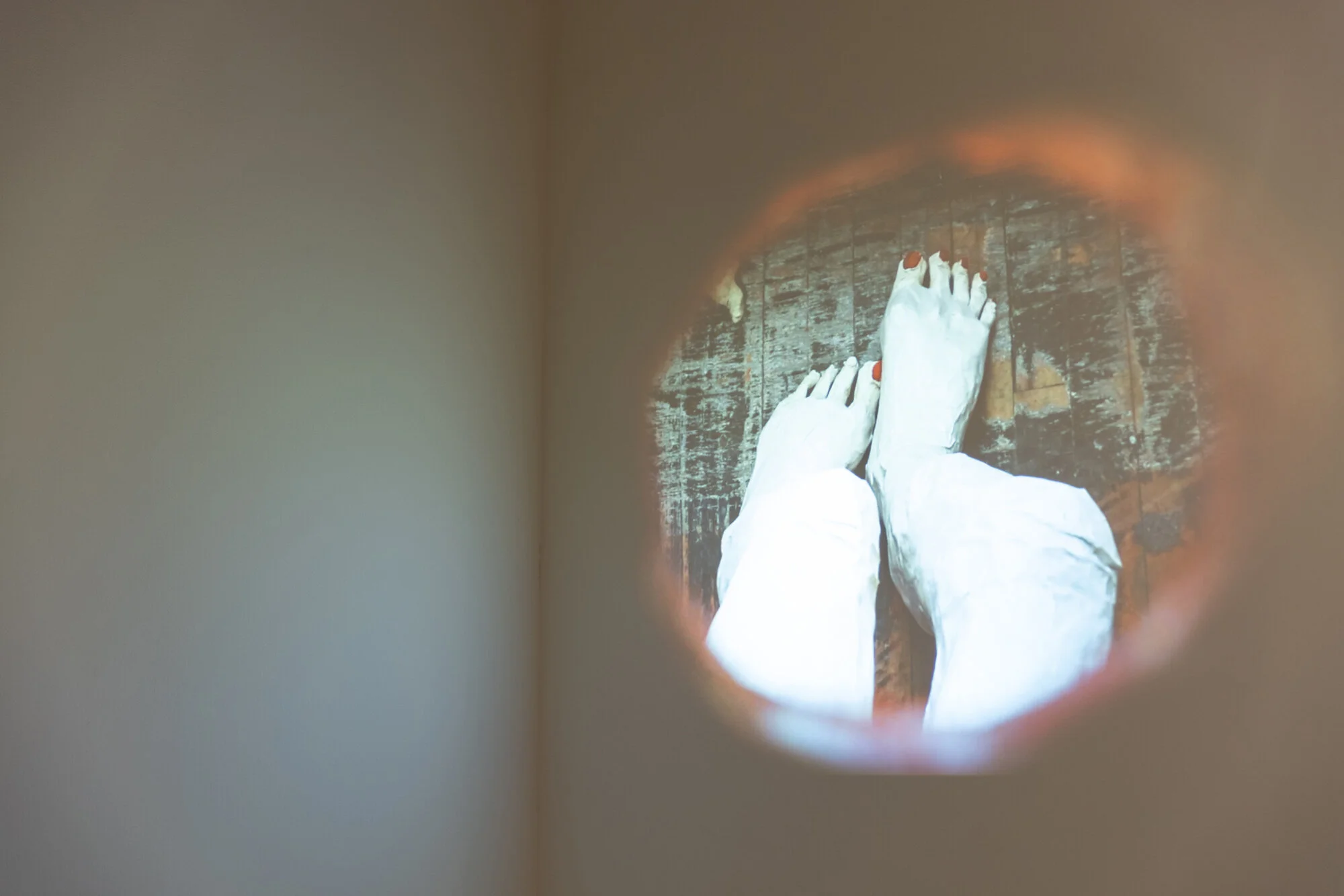   HOWW TO BEHAAYV (PEDICYUUR) , installation view of video projection, 4 x 4’, 2021   