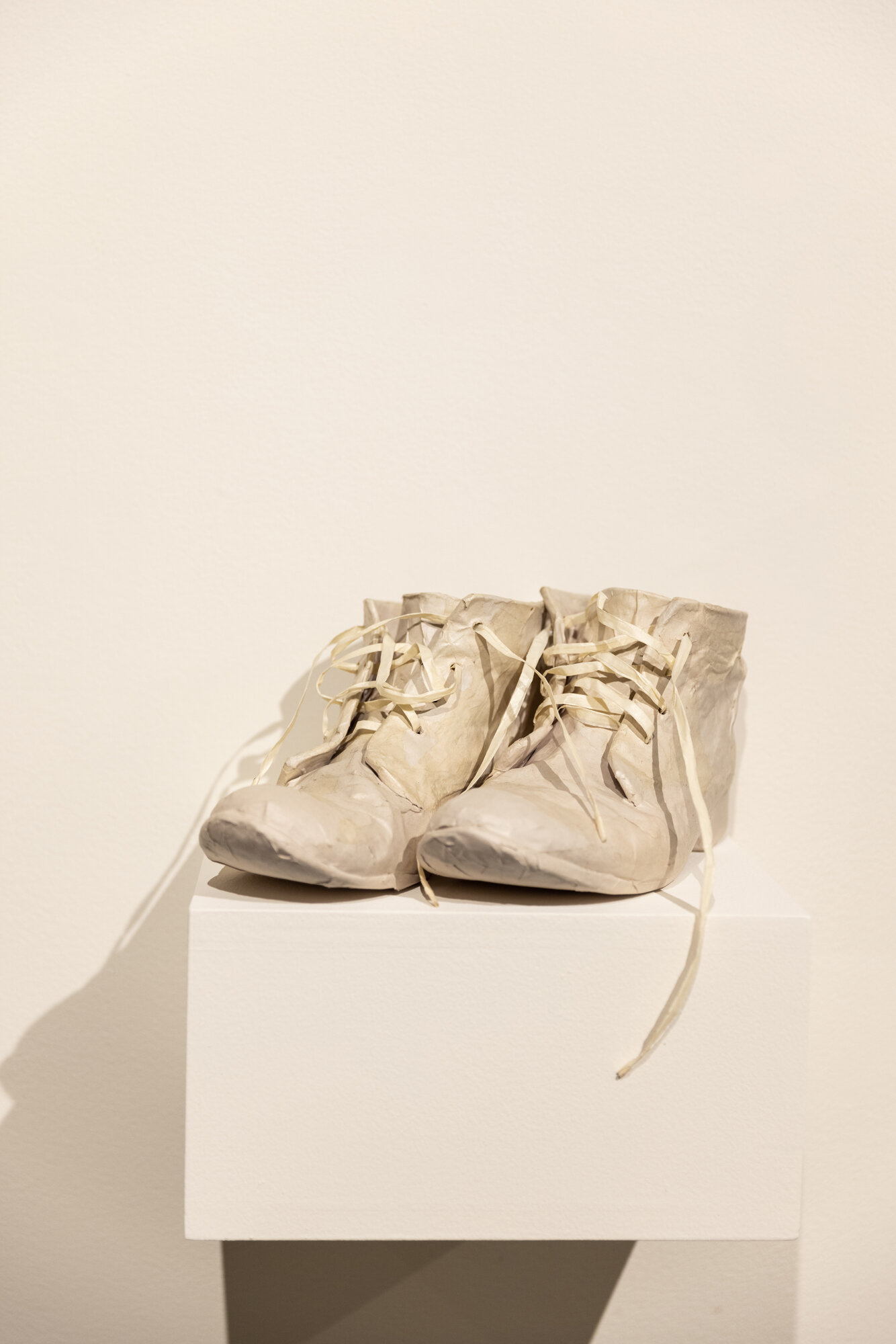   ANKUL BOOTIES , papier-mâché, repurposed shoes, 5 x 3 x 10” each, 2021   