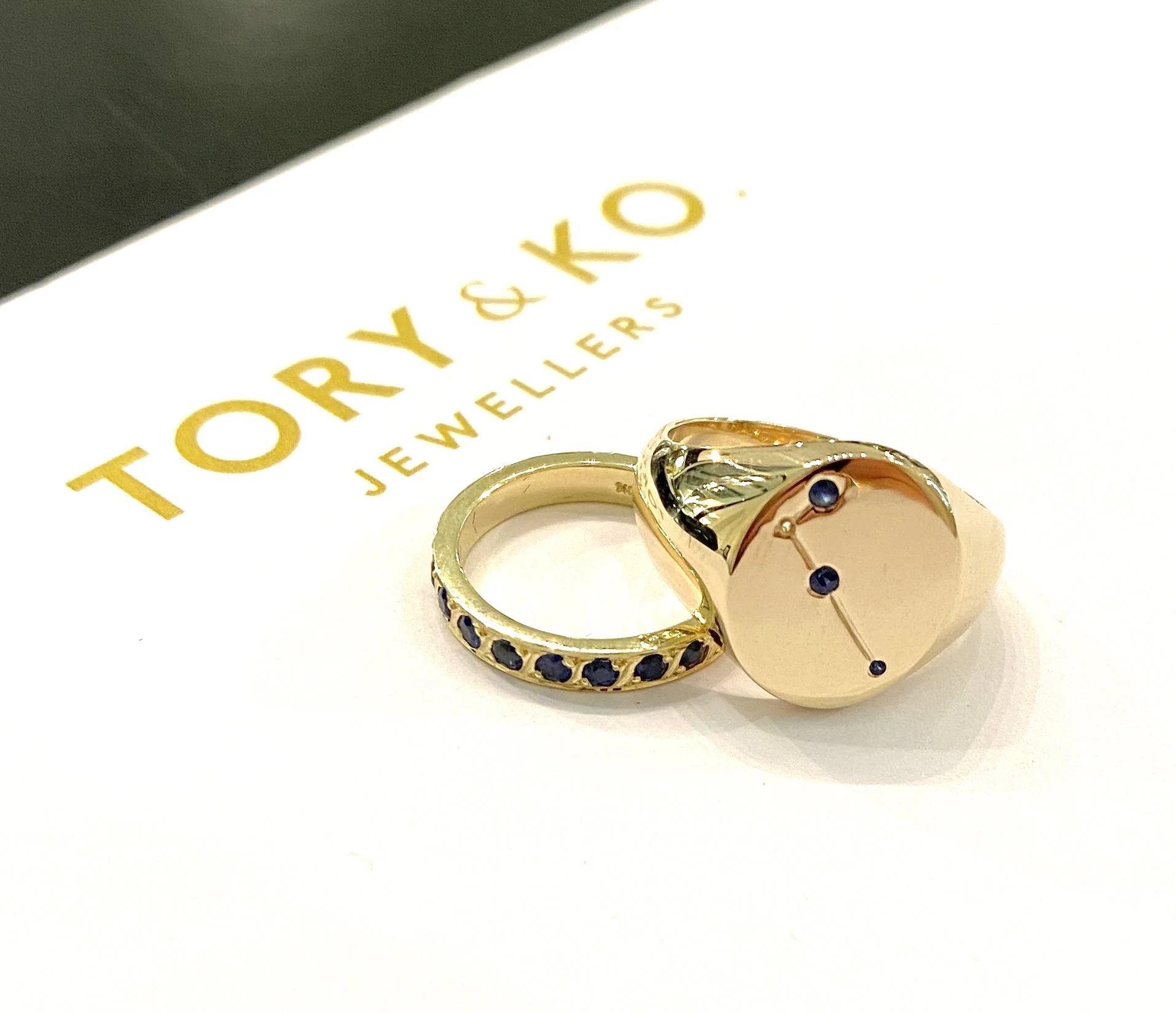 Sapphire & Gold Wedding Rings His & Her.jpg