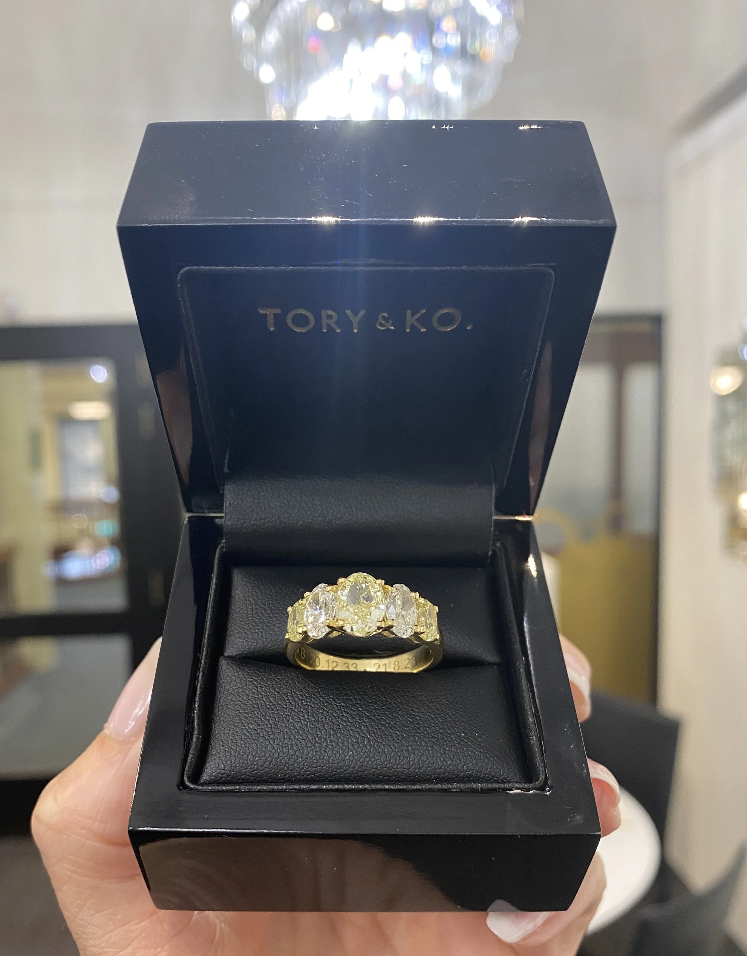Yellow and White Oval 5 stone Diamond Ring.jpg