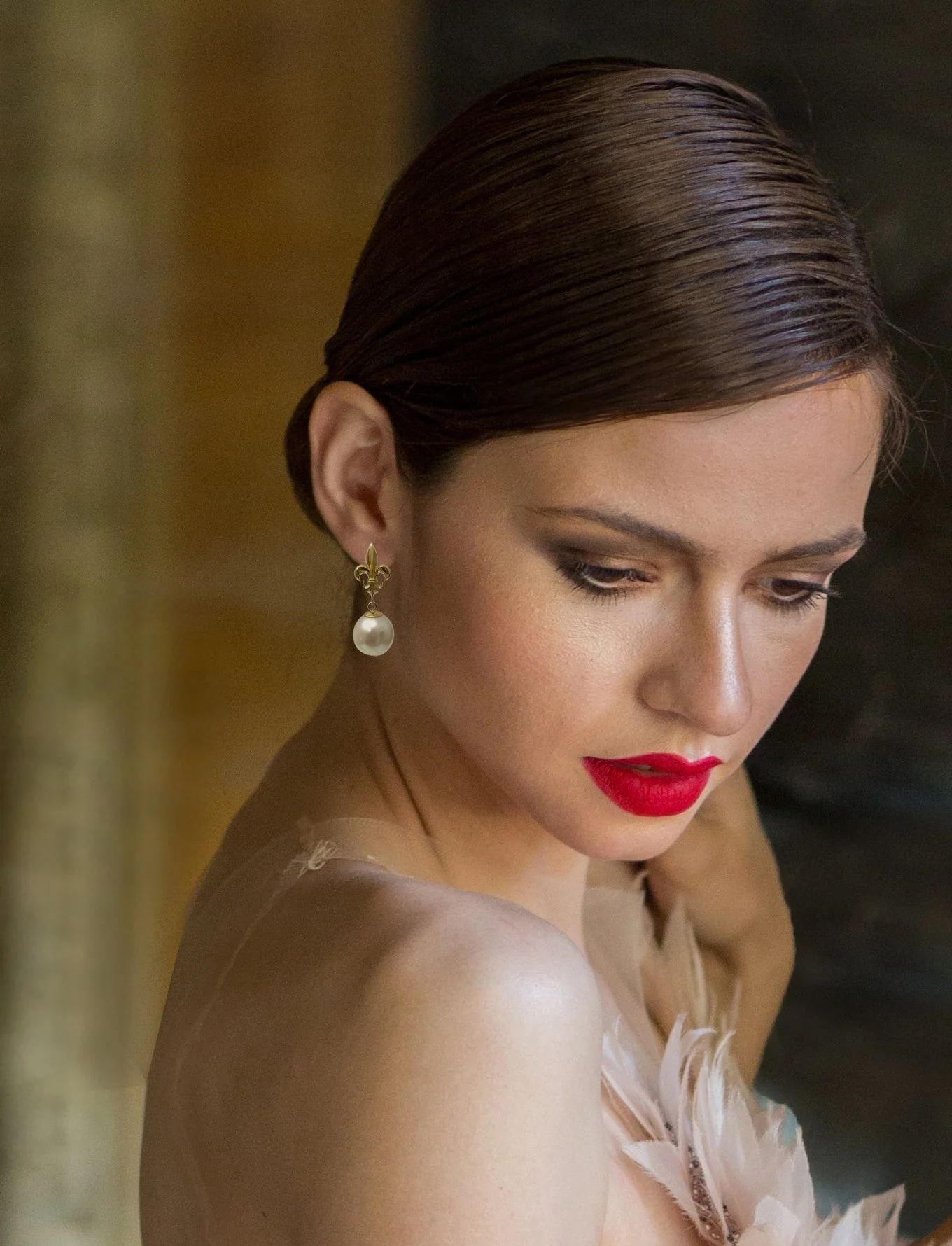 Fleur-de-lis Earring on Model photographed by Khaled Ghareeb close up.jpg