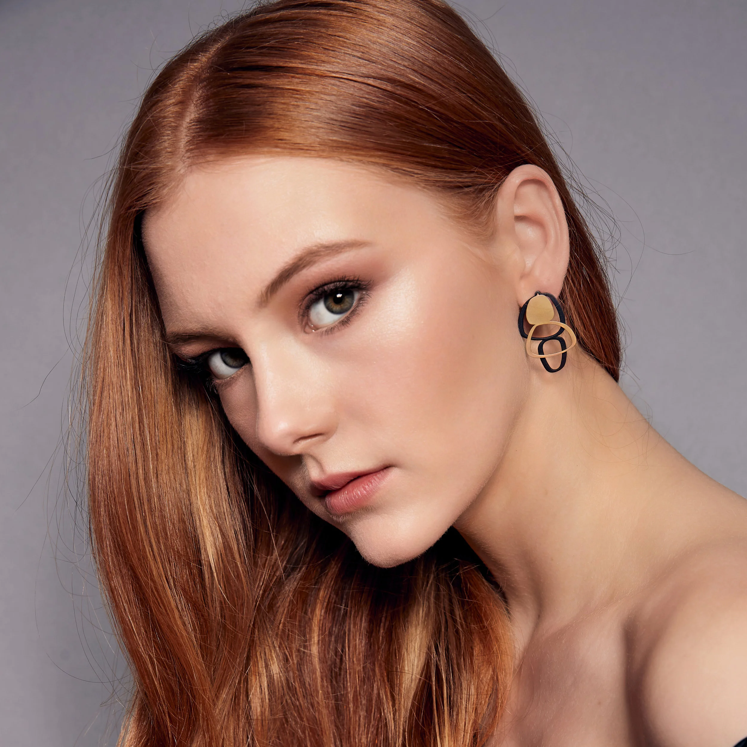 boulder stud earring gold black 2sq.jpg