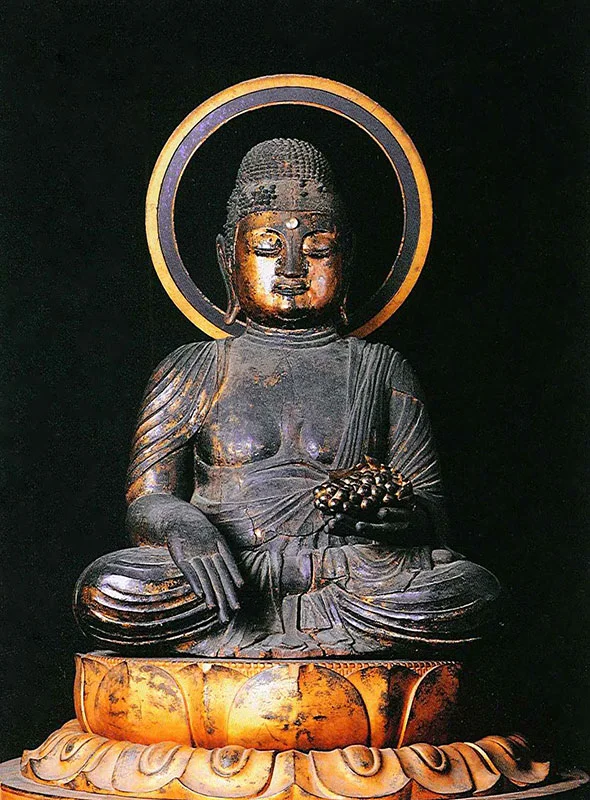 Nyorai, the Buddha of Healing and Medicine, holding a bunch of grapes, a sculpture commissioned by Gyoki based on an apparition.