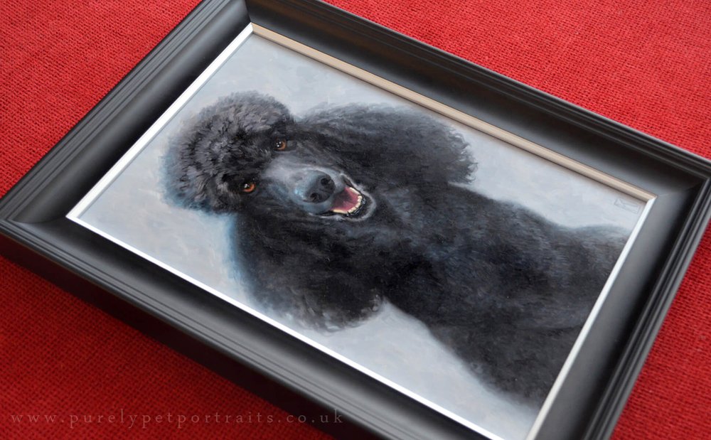 oil portrait of Greggy in a frame.JPG