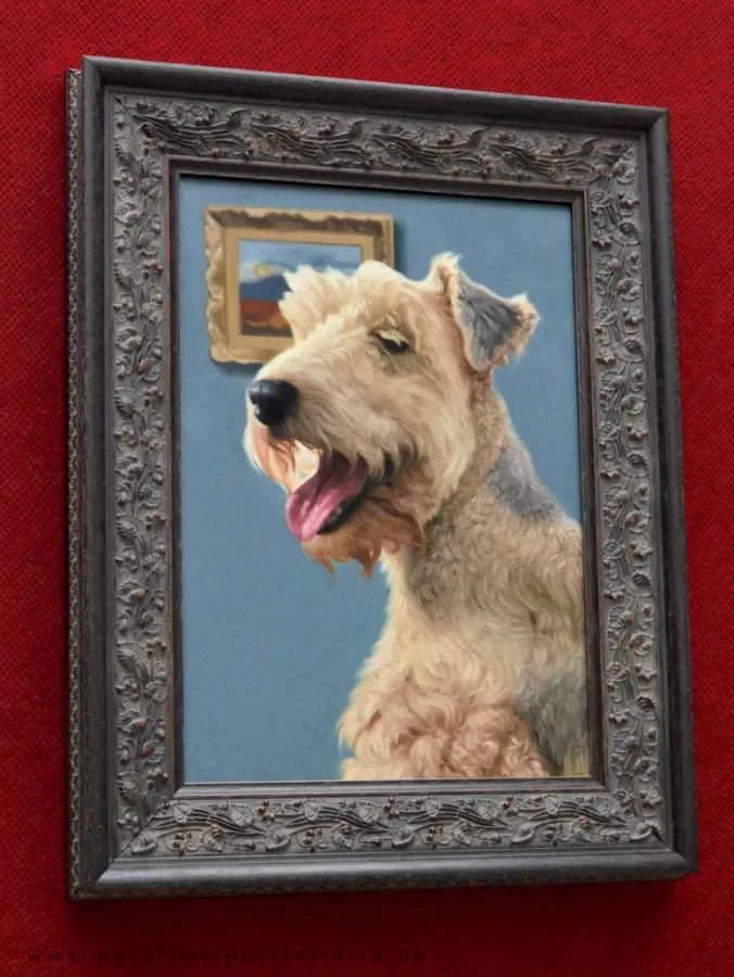 painting of a spaniel in a frame