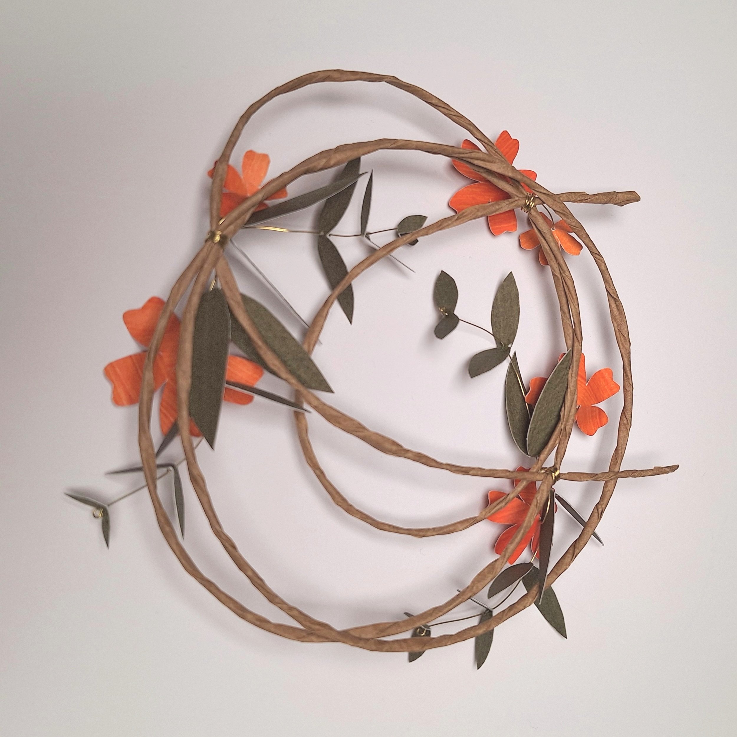back view of an orange floral wreath