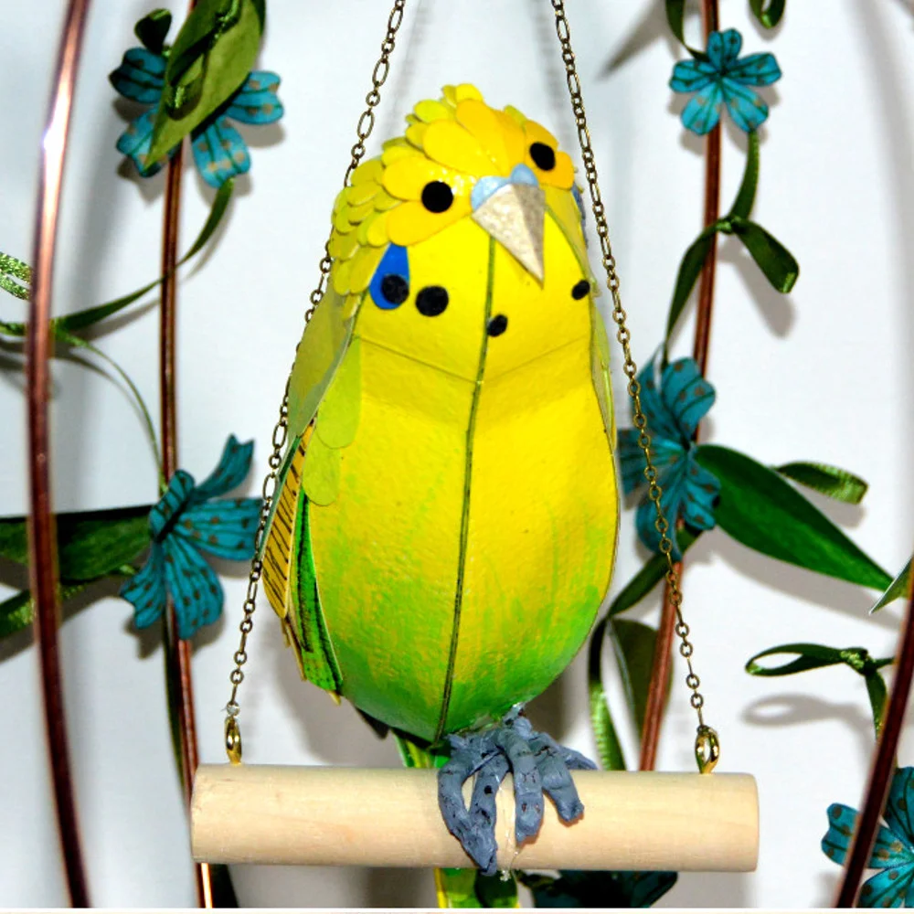 Budgies measure approximately 25 x 6 x 7 cm. Budgie on a floral swing: £110 Budgie in a floral bird cage: £150