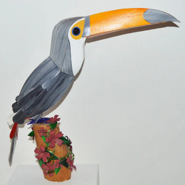 emilio the toco toucan on a floral plinth.jpg