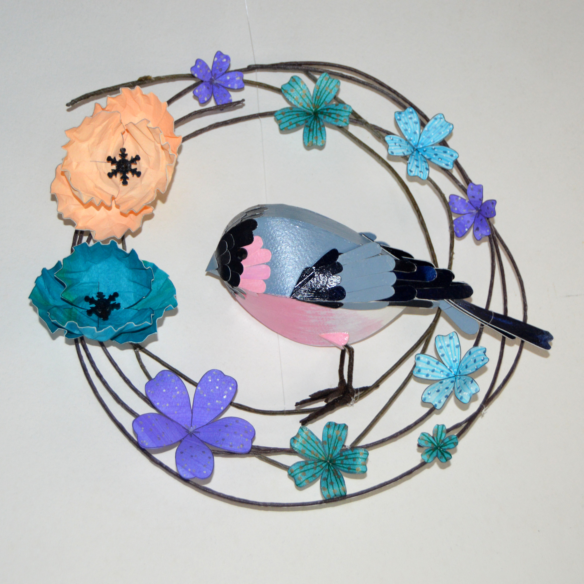 Stan the bullfinch on his floral hoop