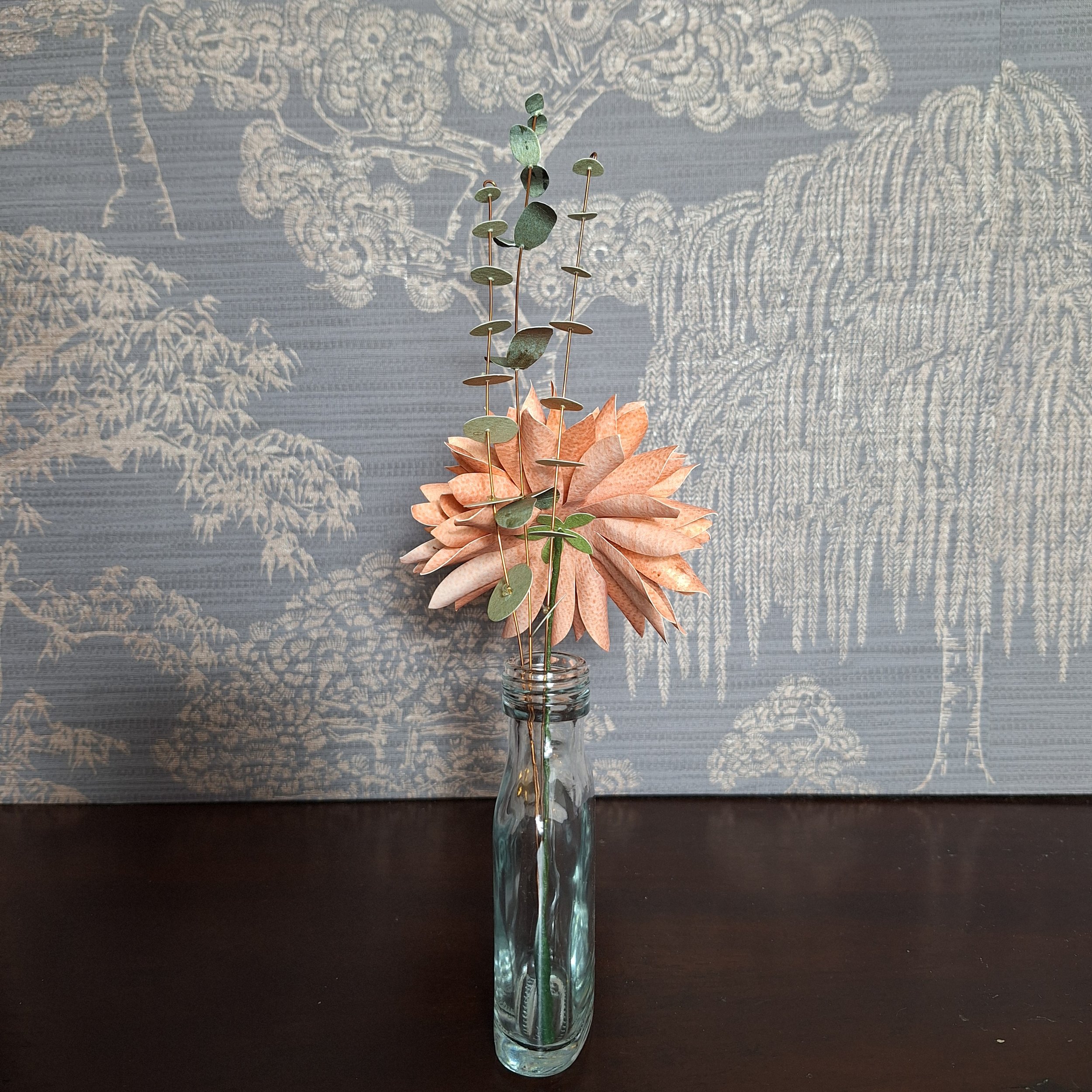 back view of a peach coloured dahlia paper flower