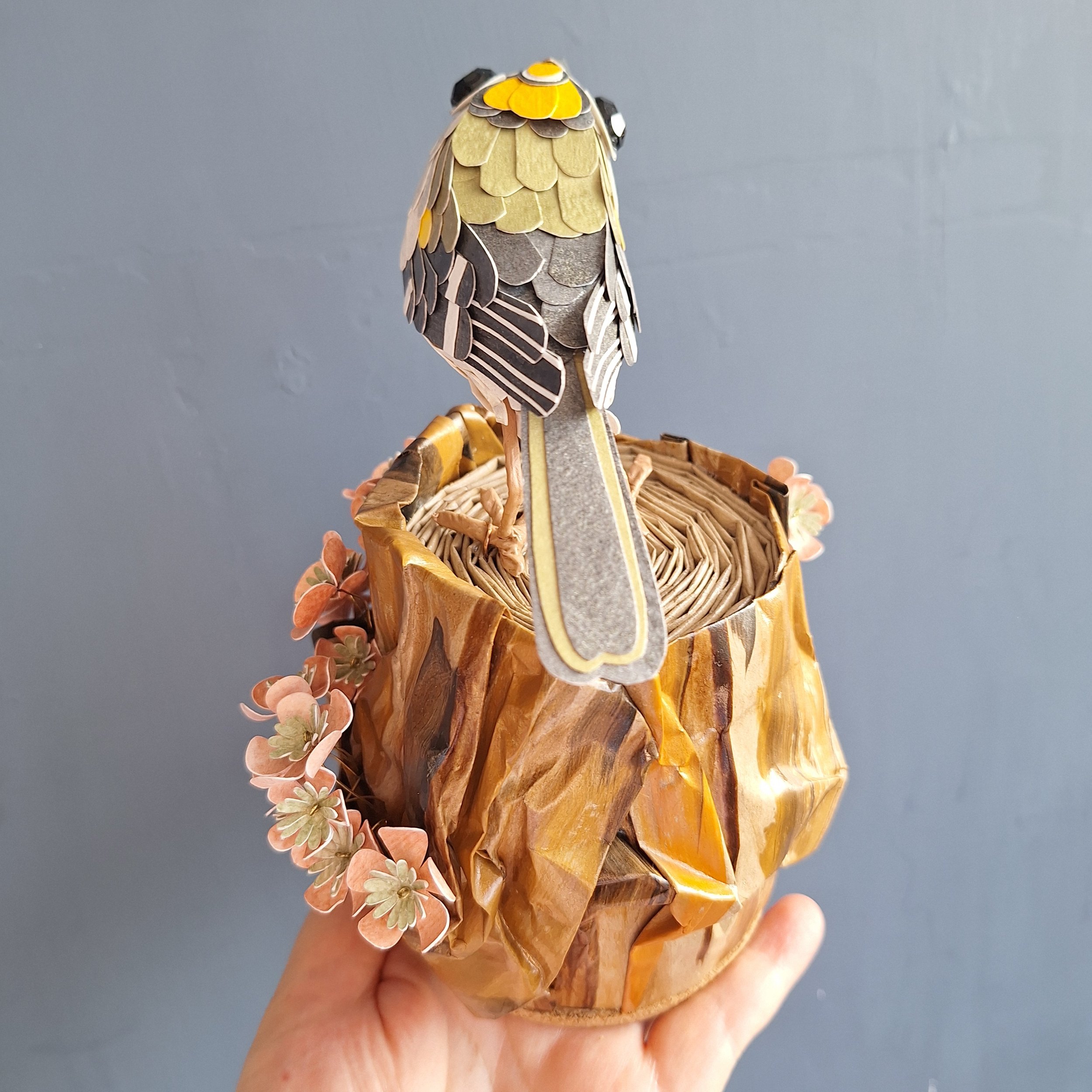 back view of a goldcrest bird sculpture