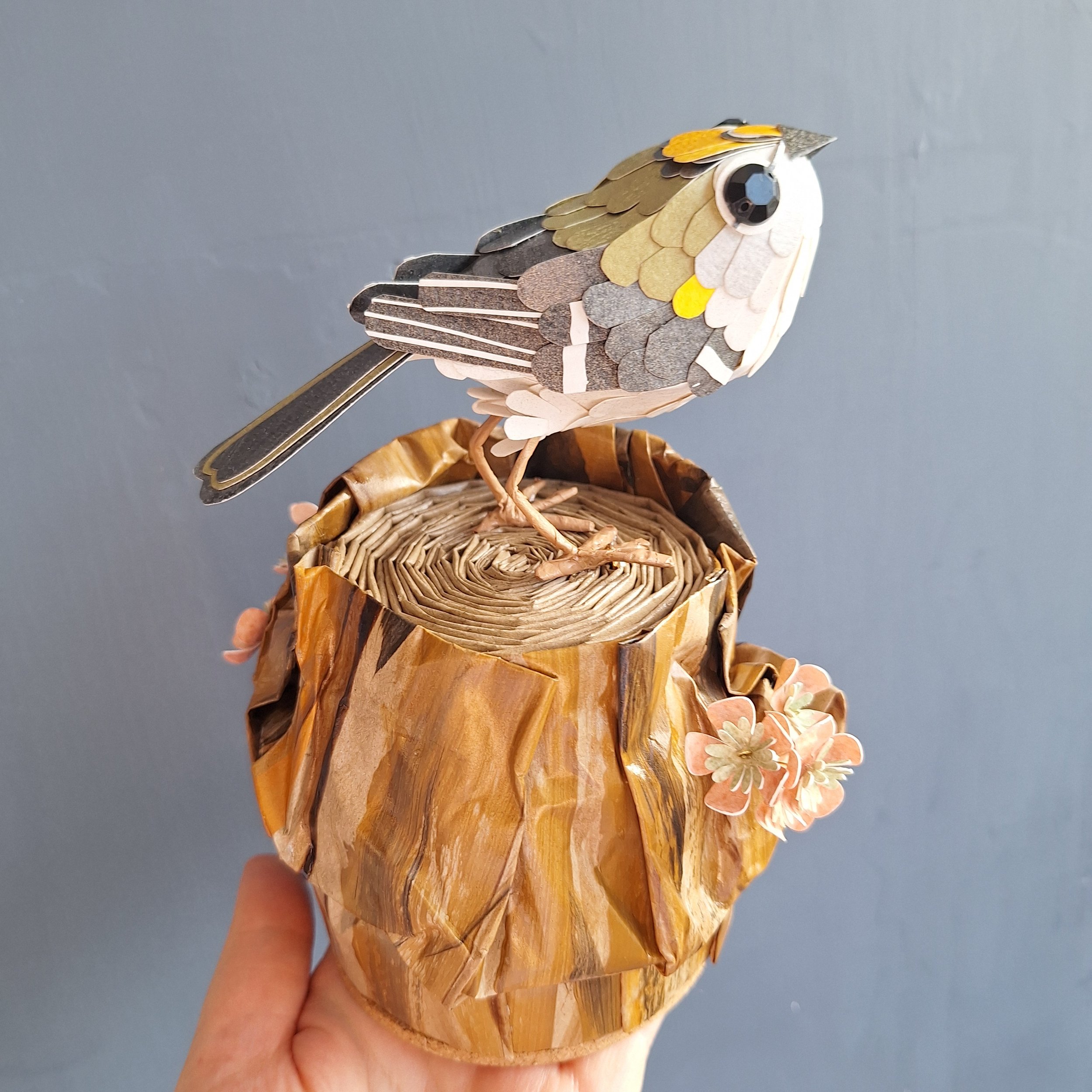 handmade home décor item featuring a goldcrest bird