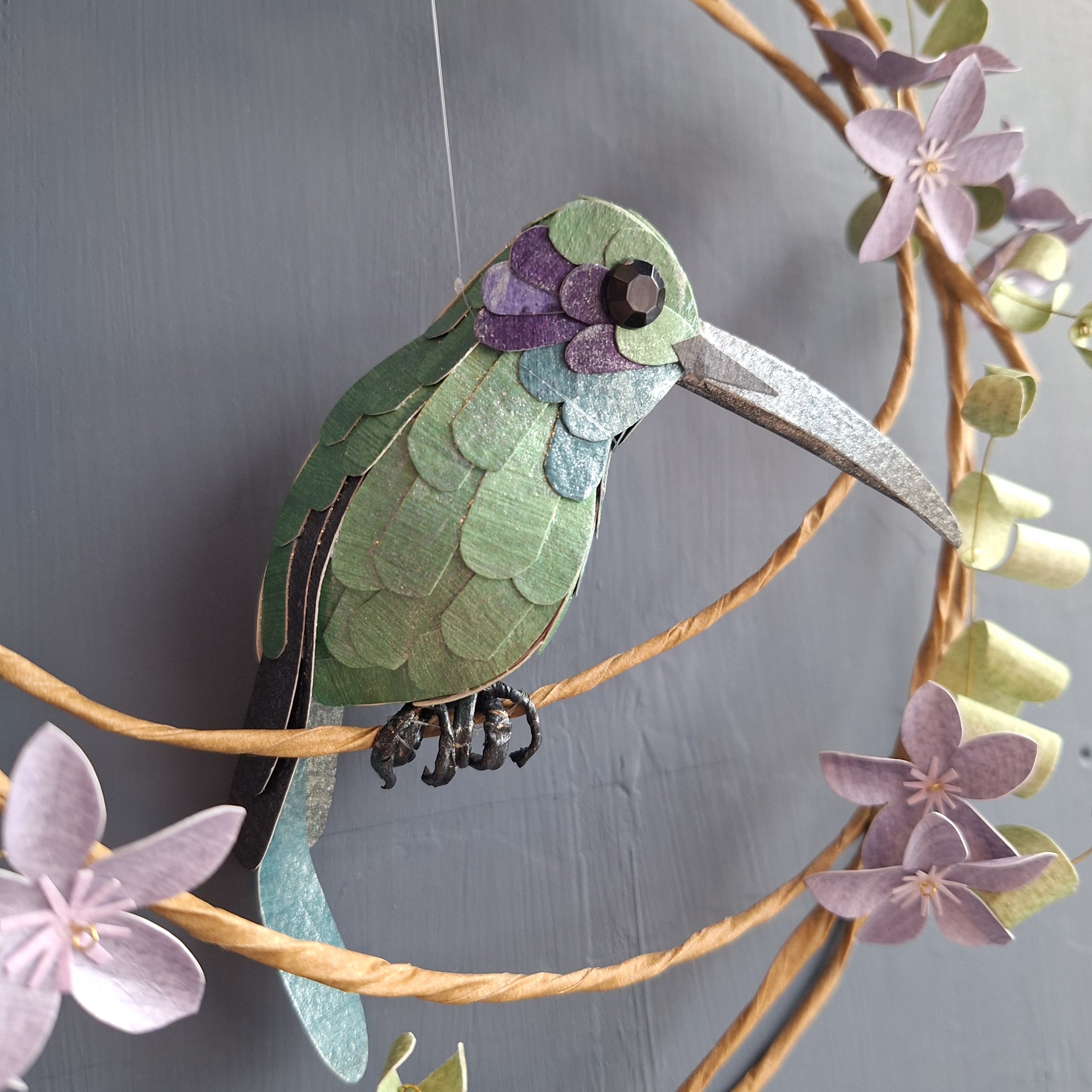 Handmade bird sculpture of a Mexican Violetear Hummingbird