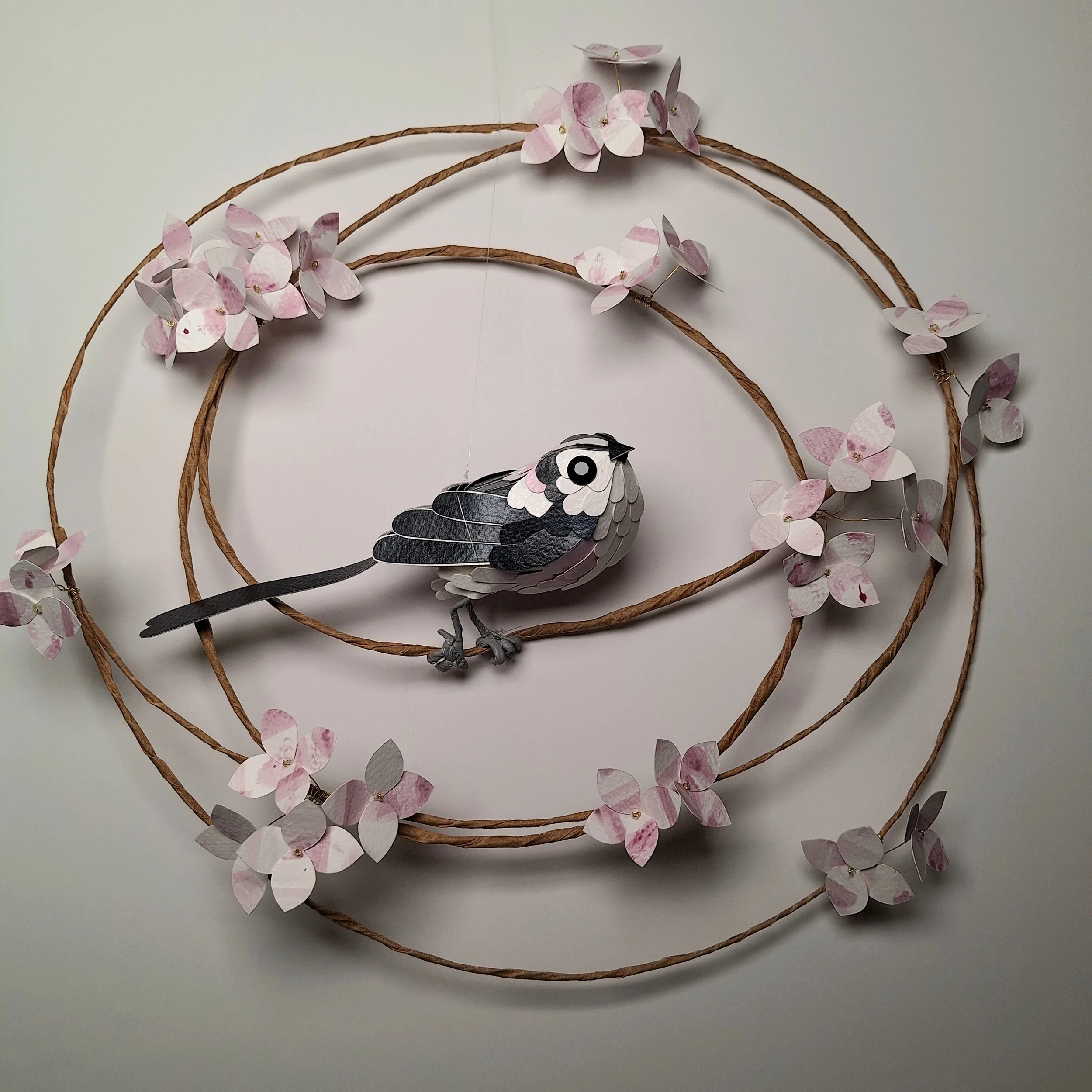 Long Tailed Tit on a pink and white hydrangea wreath
