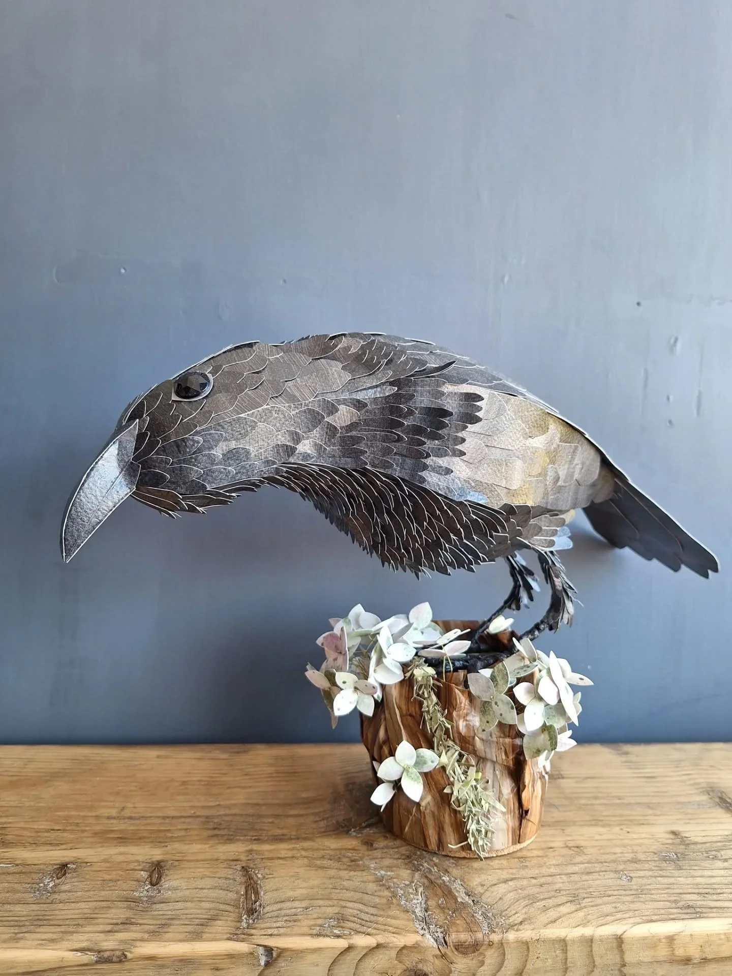 I'm doing a spot of DIY in my workroom, which includes putting up a shelf in this sunspot by the window so I can take photos of my standing sculptures. The sunlight really show all the different shades of black on the feathers of this raven. I've use