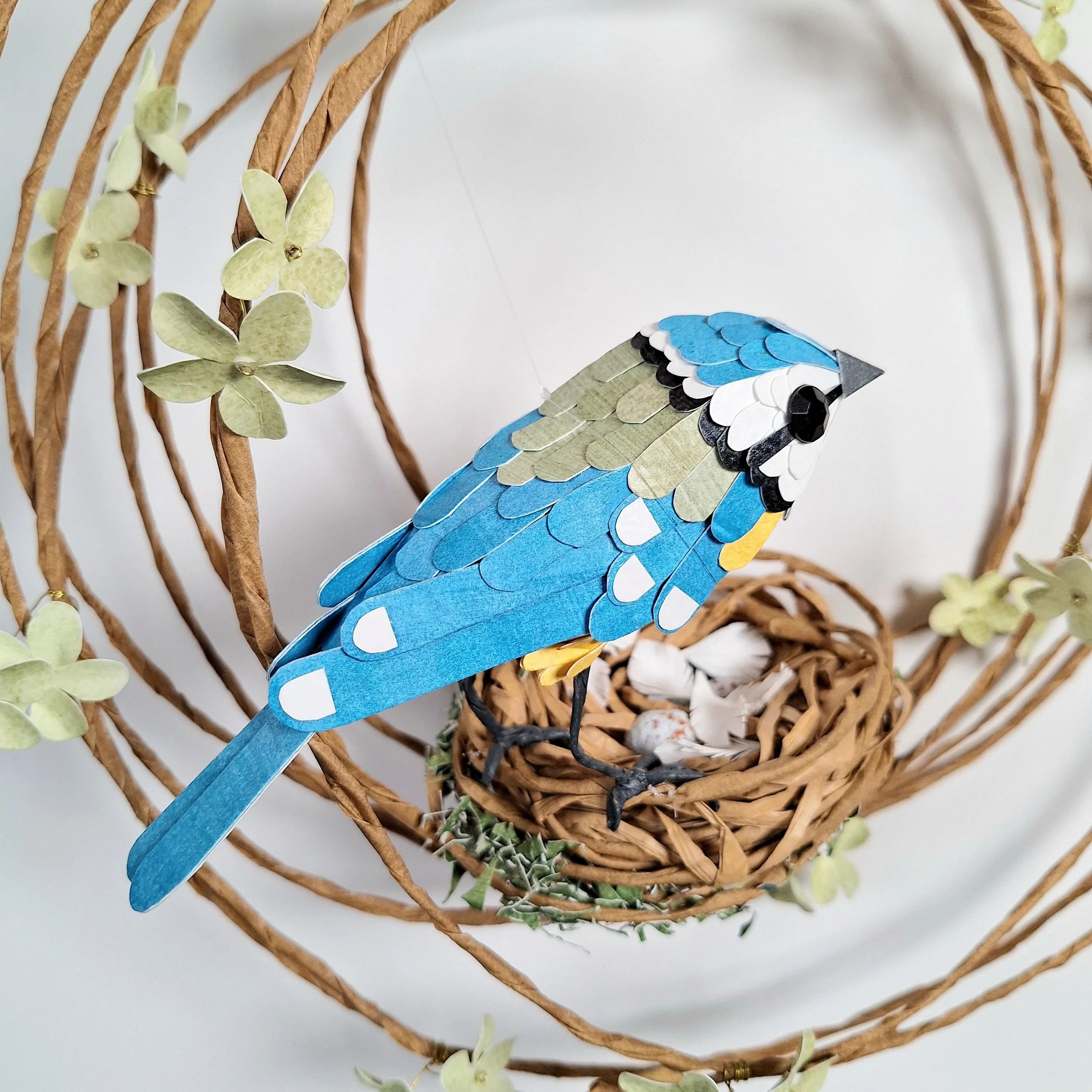 Side view of the blue tit bird sculpture