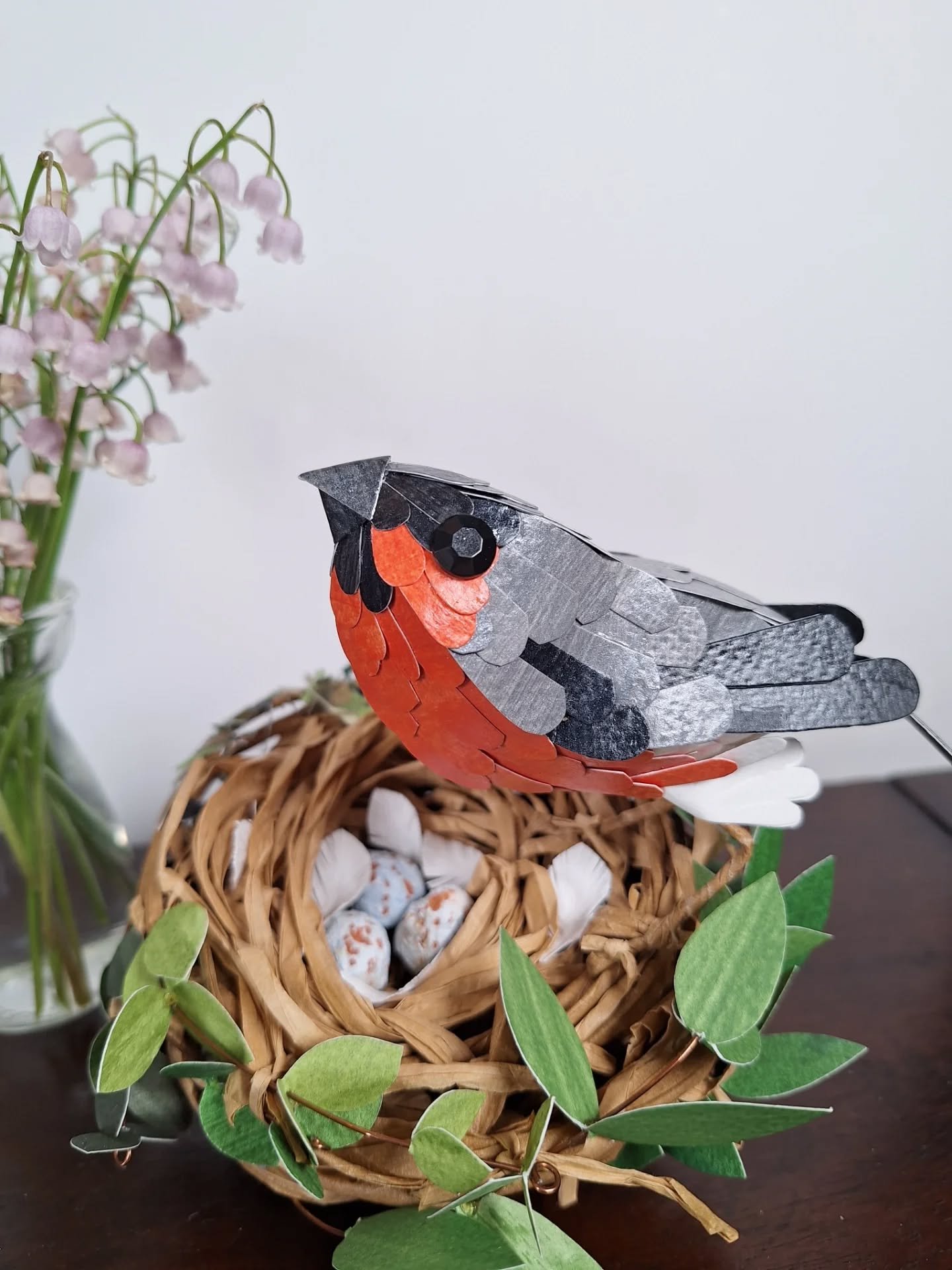 A happy little Bullfinch on his nest of three eggs 😊 I love the colours of a Bullfinch. There's something really pleasing about his coral belly.