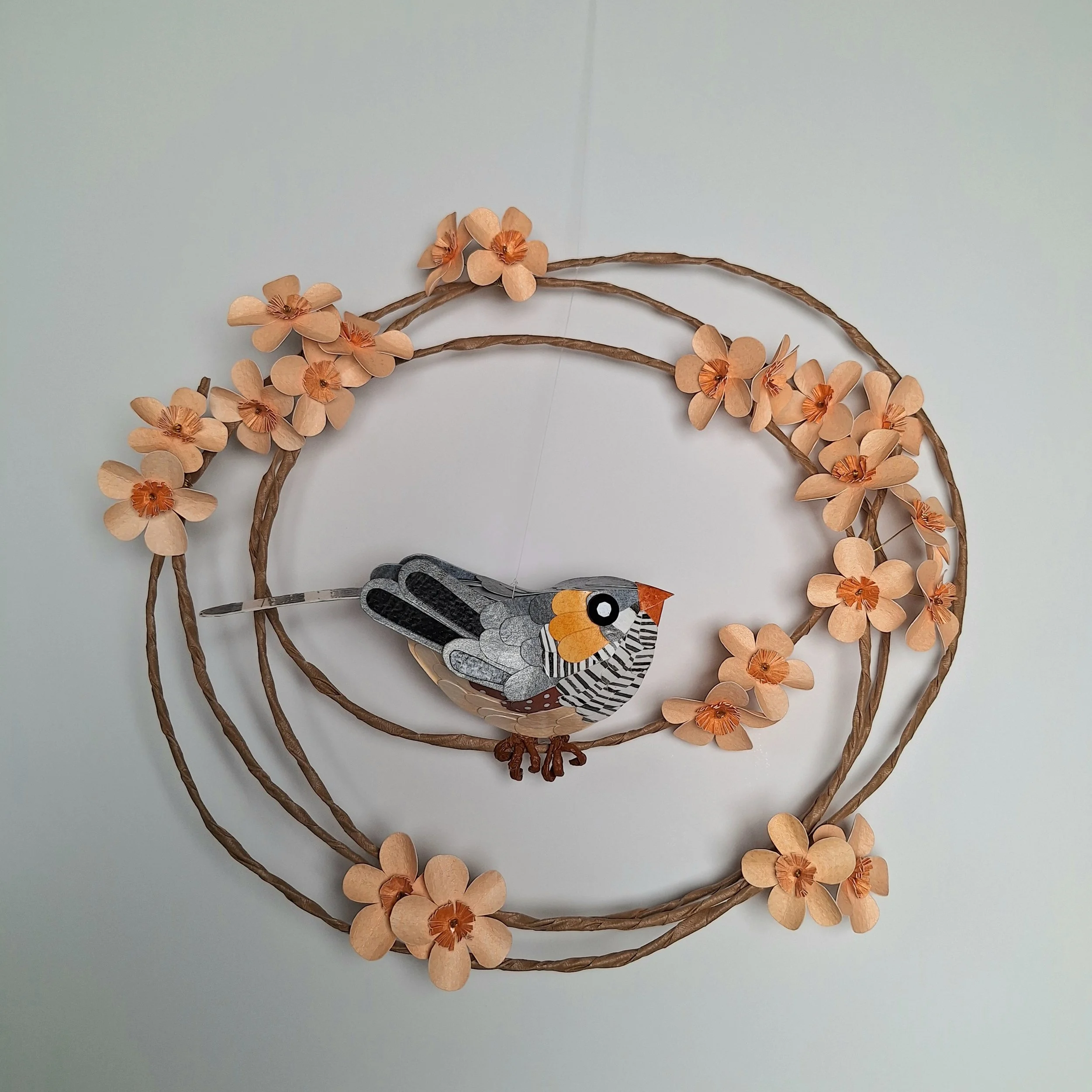 Kaper zebra finch bird on a floral hoop wall art (1).jpg