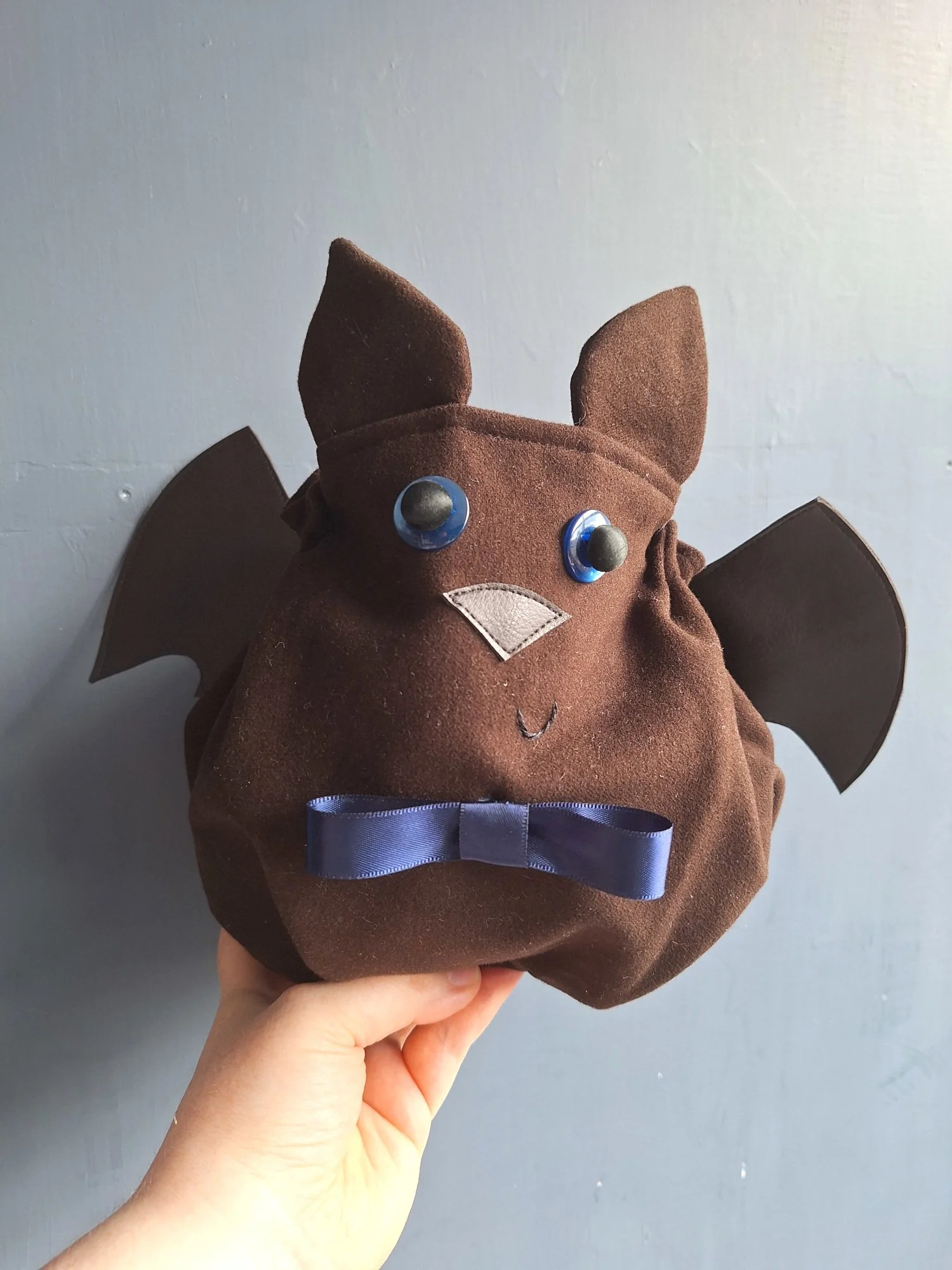 Bat with bow tie drawstring pouch