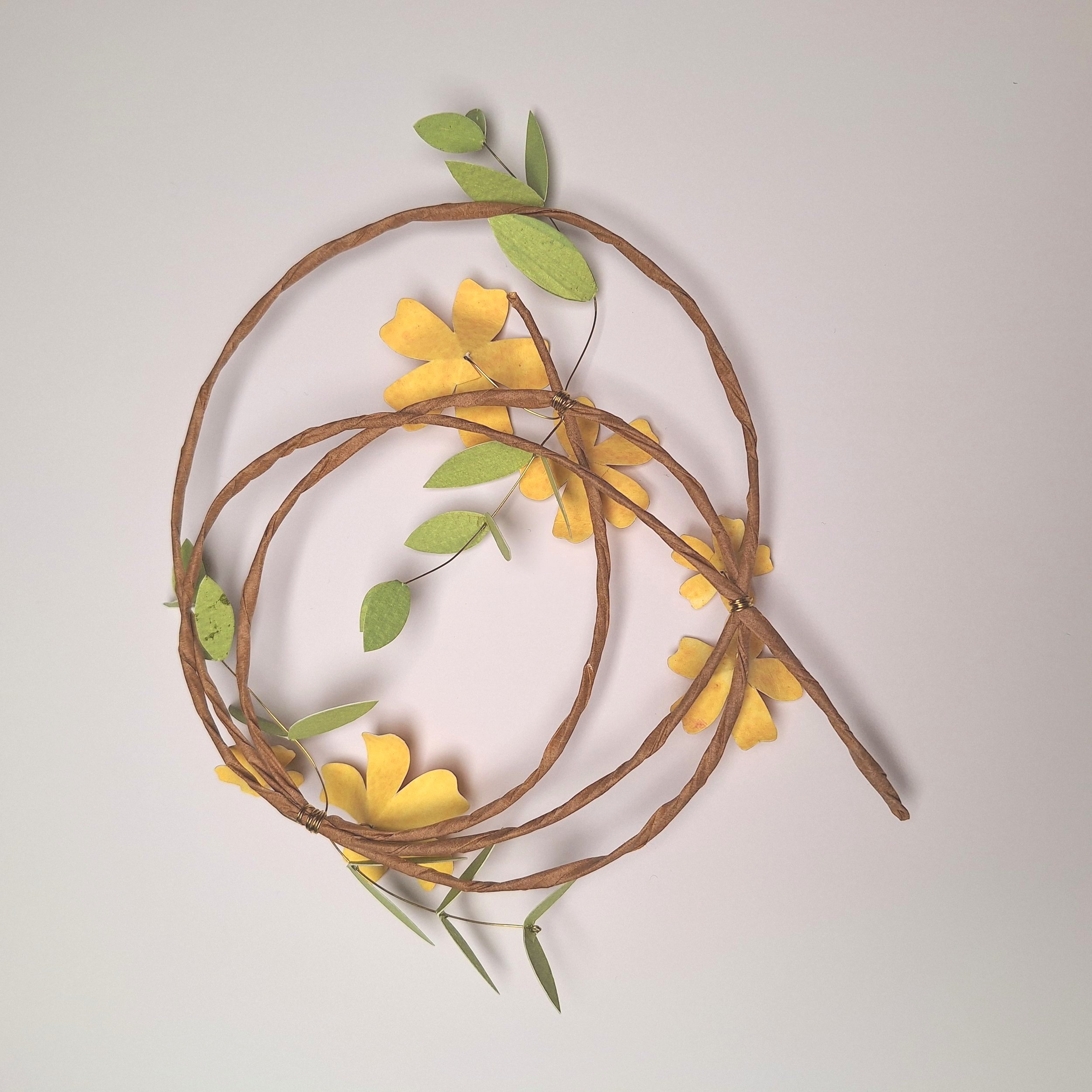 back view of a yellow flower wreath