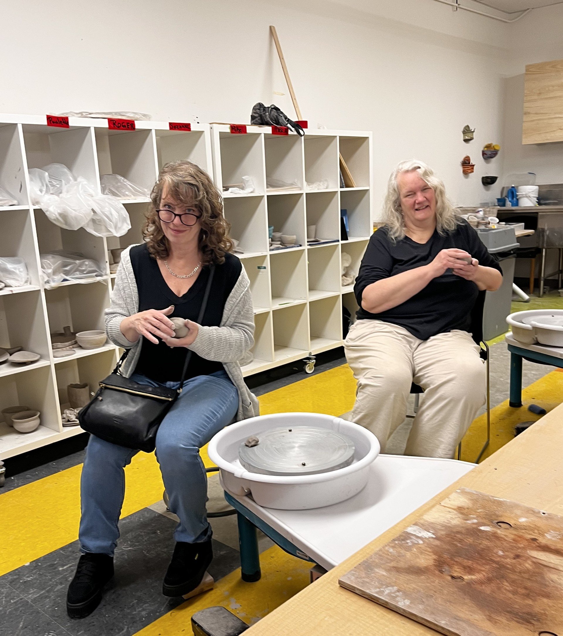 Julie and Sheila playing with clay.