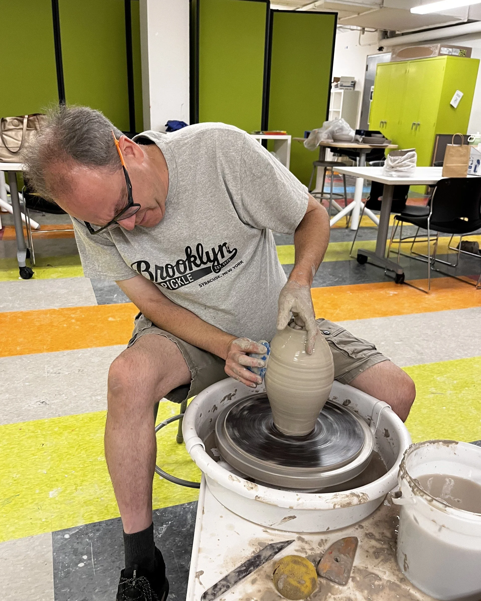 Dave throwing a vase.