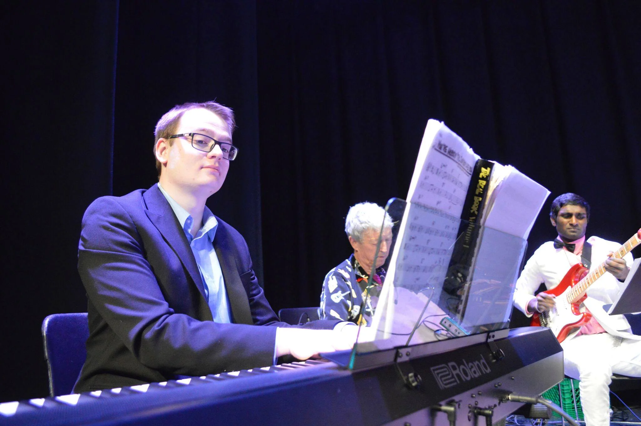 Performing a jazz set at the James Faraday Memorial Concert with guitarists Scott MacMillan and Dilshan Weerasinghe. Photo: Paige Meunier.