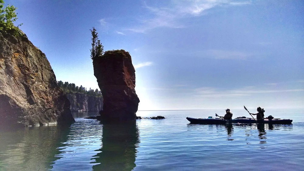 Kayaking a Lake Superior sea cave and sea arch