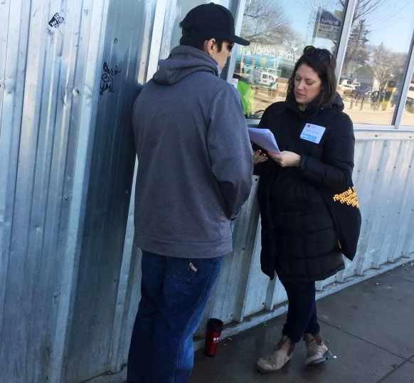 Jolene Zidkovich, right, conducts a survey as part of a point-in-time homeless count in Saskatoon on Wednesday, April 18, 2018. (Laura Woodward/CTV Saskatoon)