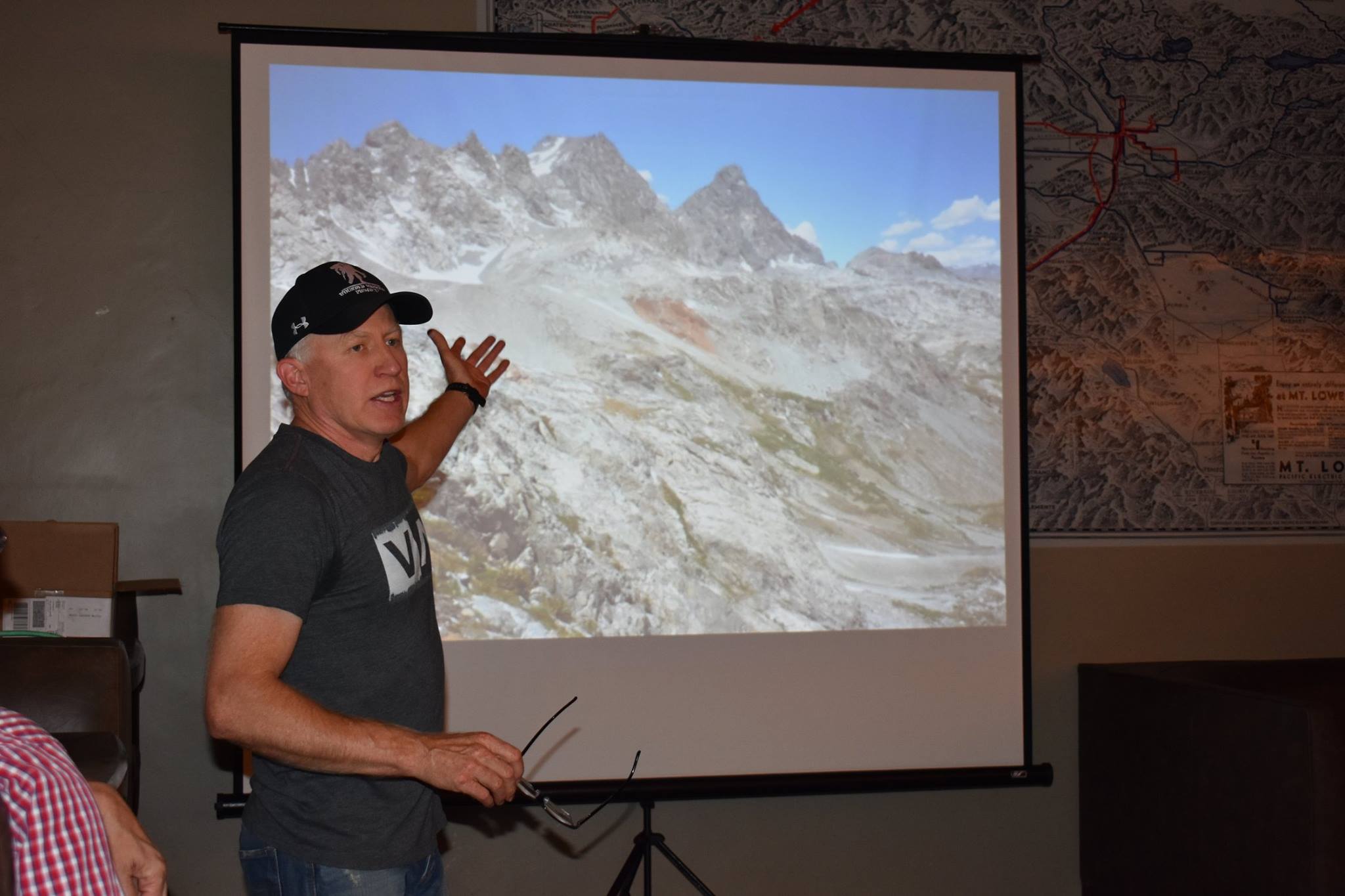 Dean speaking at an REI event