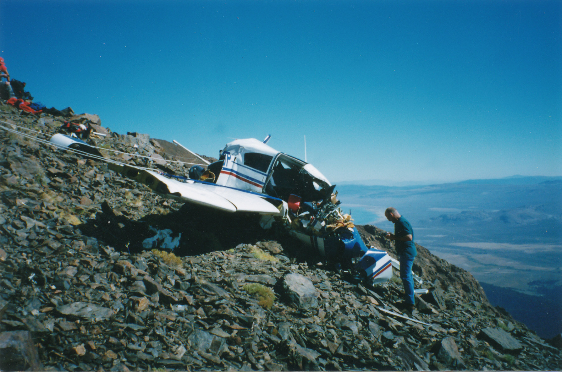 Recovering the remains of two victims of a plane crash at 11,000 feet