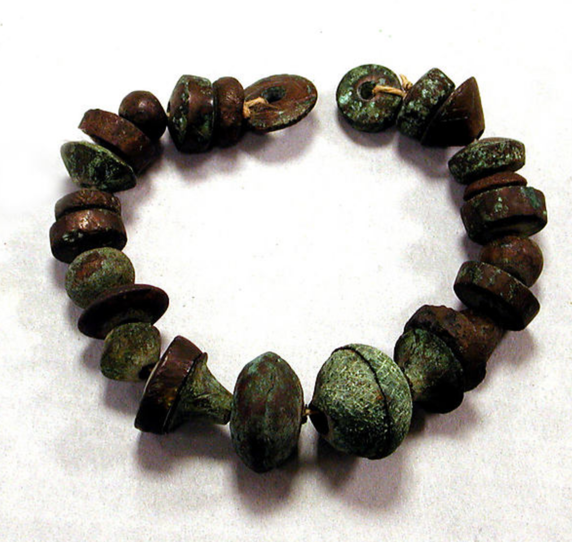 Copper and ceramic beads/whorls, 1200-1470 CE, Peruvian - The Metropolitan Museum of Art https://www.metmuseum.org/art/collection/search/309223